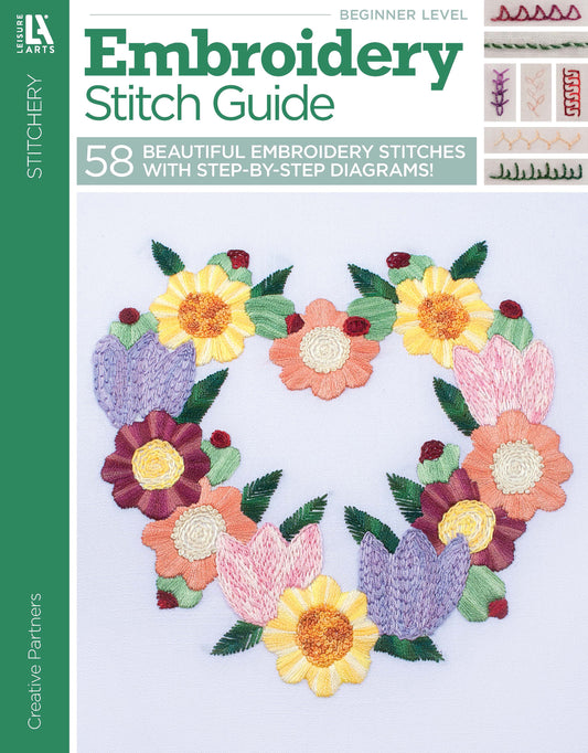 Leisure Arts Embroidery Stitch Guide book cover features a heart-shaped floral embroidery on white fabric. Ideal for beginners, it showcases 58 stitches with step-by-step diagrams and vibrant flowers and leaves.