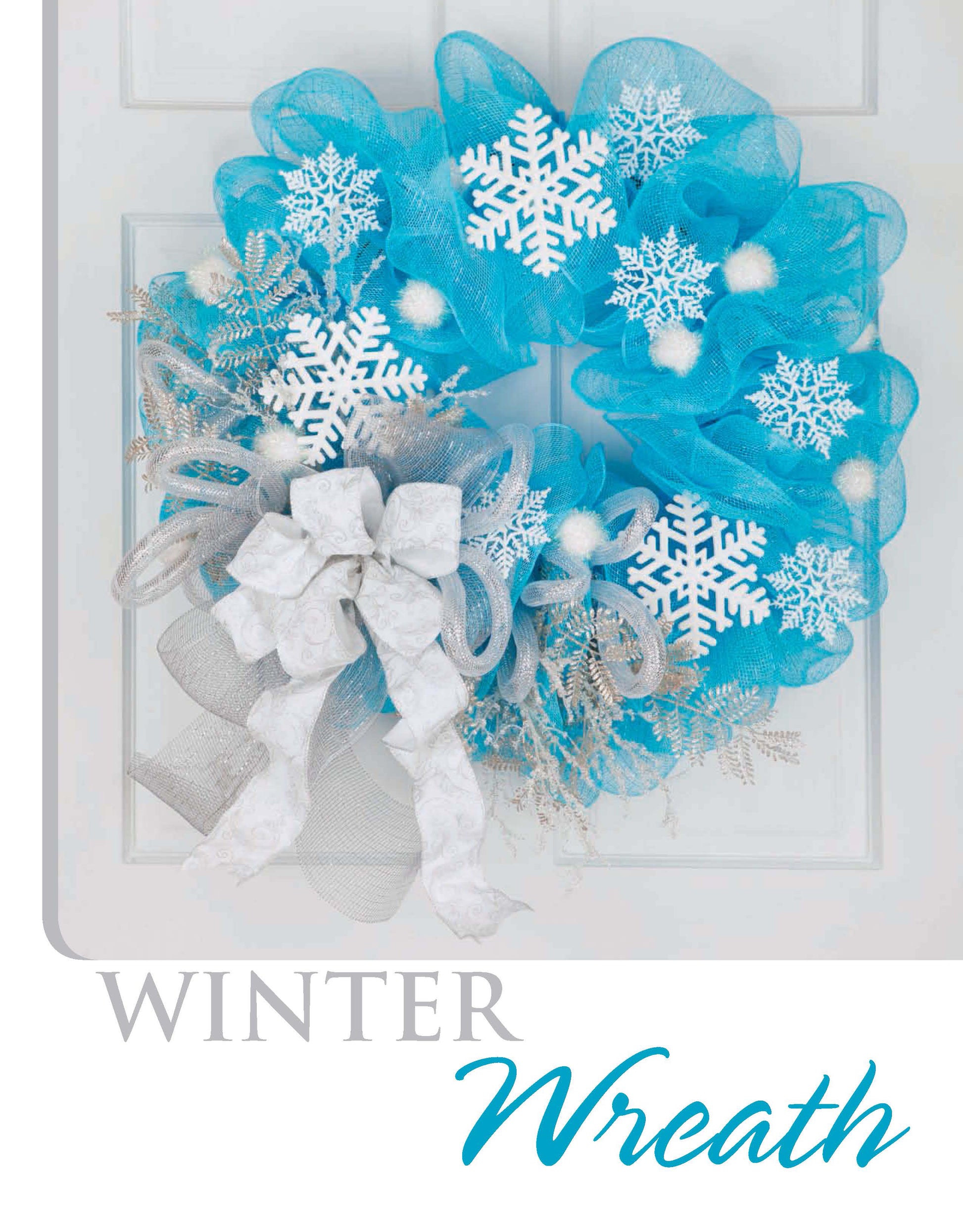 The Deco Mesh Wreaths by Leisure Arts features blue and white colors, snowflakes, pom-poms, silver branches, and a large bow on a white door—ideal for holiday crafts. Text reads “WINTER Wreath.”.