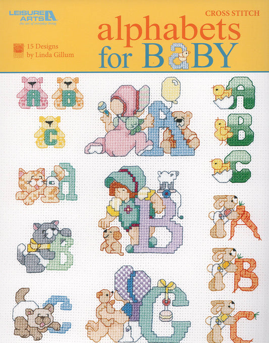 Cover of Leisure Arts' Alphabets for Baby pattern book, featuring colorful cross-stitched A-G letters with playful animals and baby motifs—ideal for personalized, charming alphabet designs on a white background.