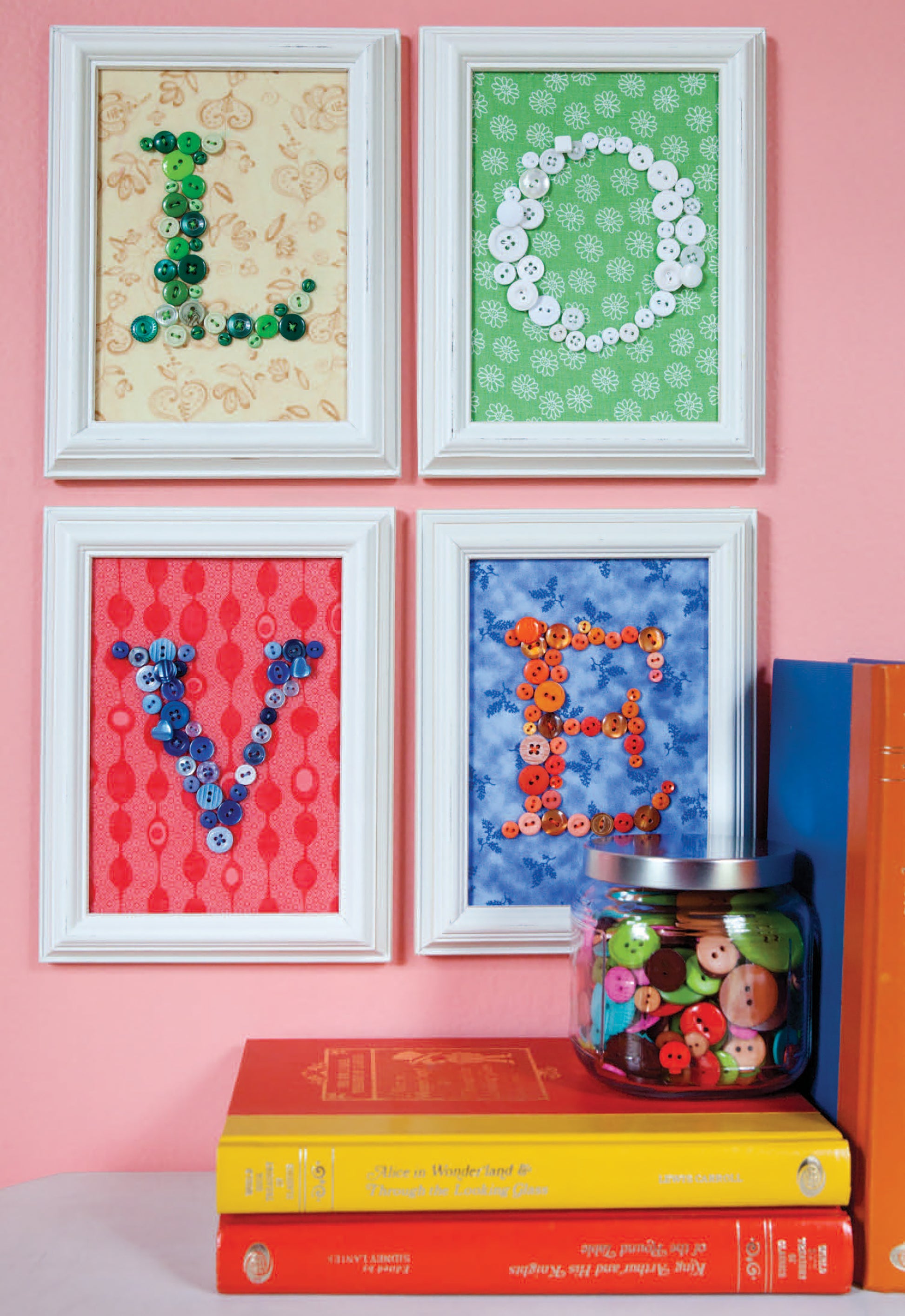 Add charming flair to your home with "Crafting with Buttons and Ribbons" by Leisure Arts—featuring colorful button letters on patterned backgrounds, perfect above stacked books or as inspiration for needlework and paper craft lovers.