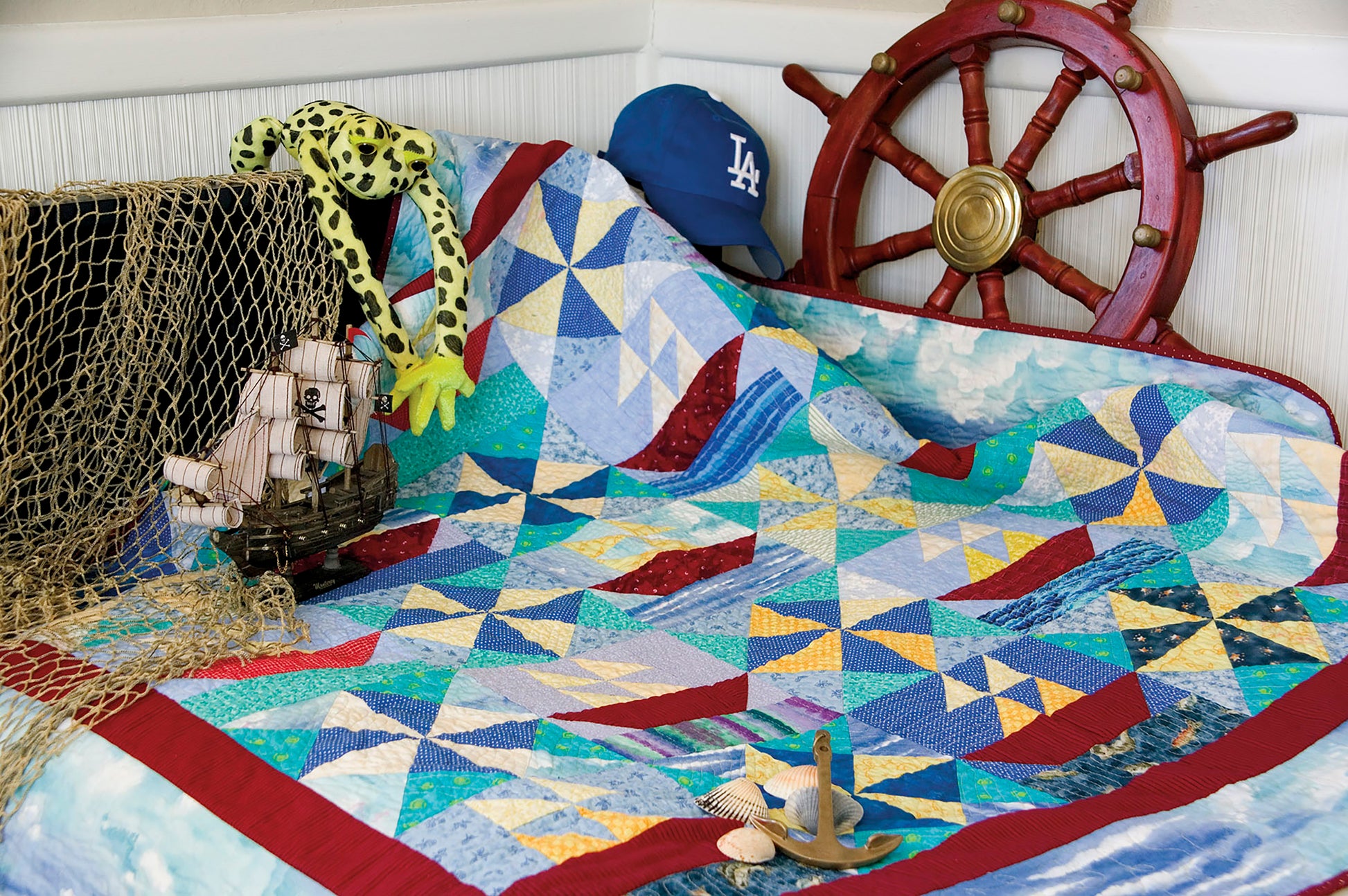 The Simple Beginner Quilts Digital Download by Leisure Arts is perfect for adventurous beginners, featuring colorful patchwork designs inspired by blue, yellow, and red patterns—ideal for your next creative project.