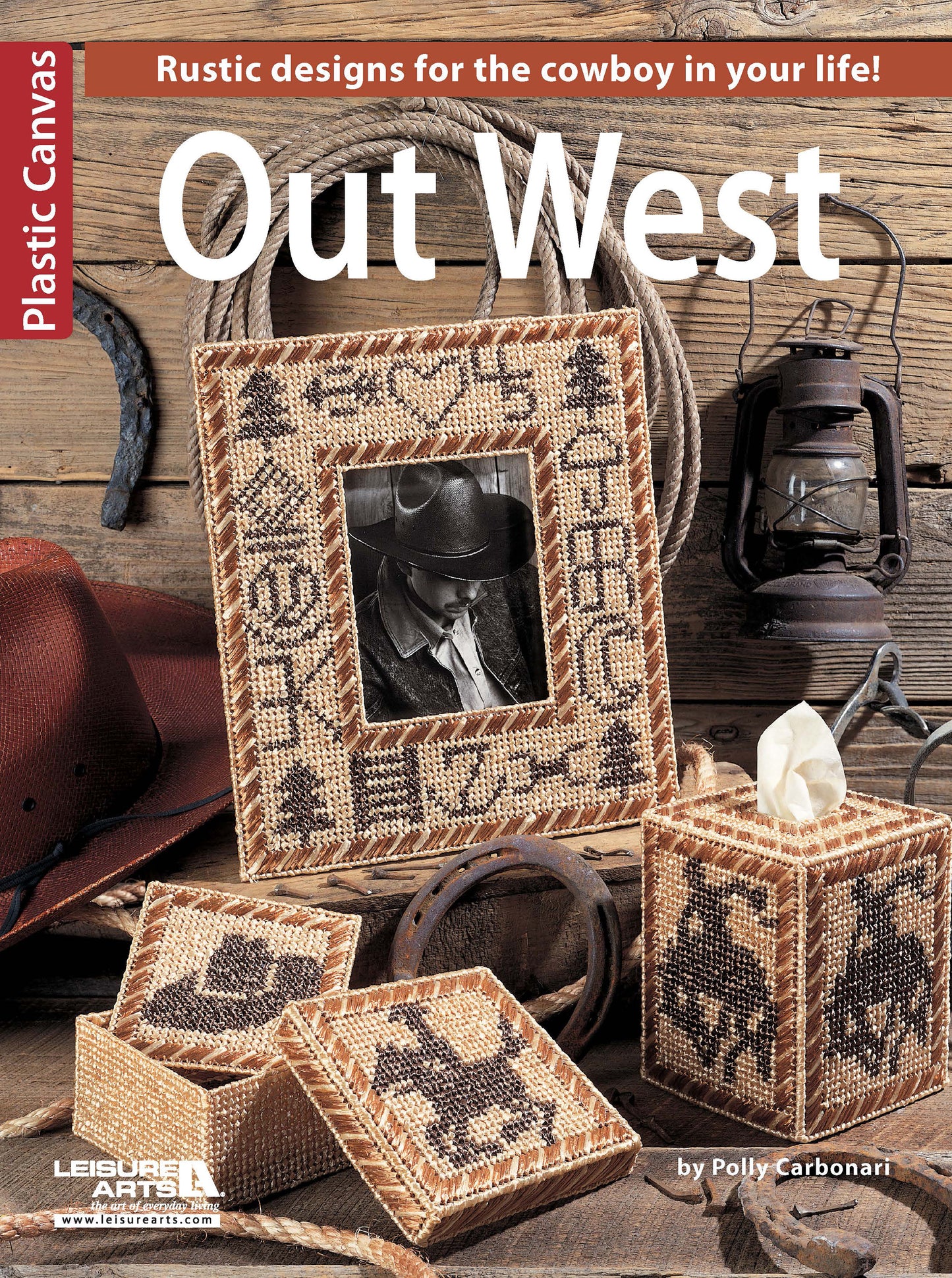 The cover of Leisure Arts' digital download "Out West—Rustic Designs for the Cowboy in Your Life!" features Western-inspired plastic canvas projects like cowboy-patterned frames, boxes, rodeo silhouettes, and rustic décor.