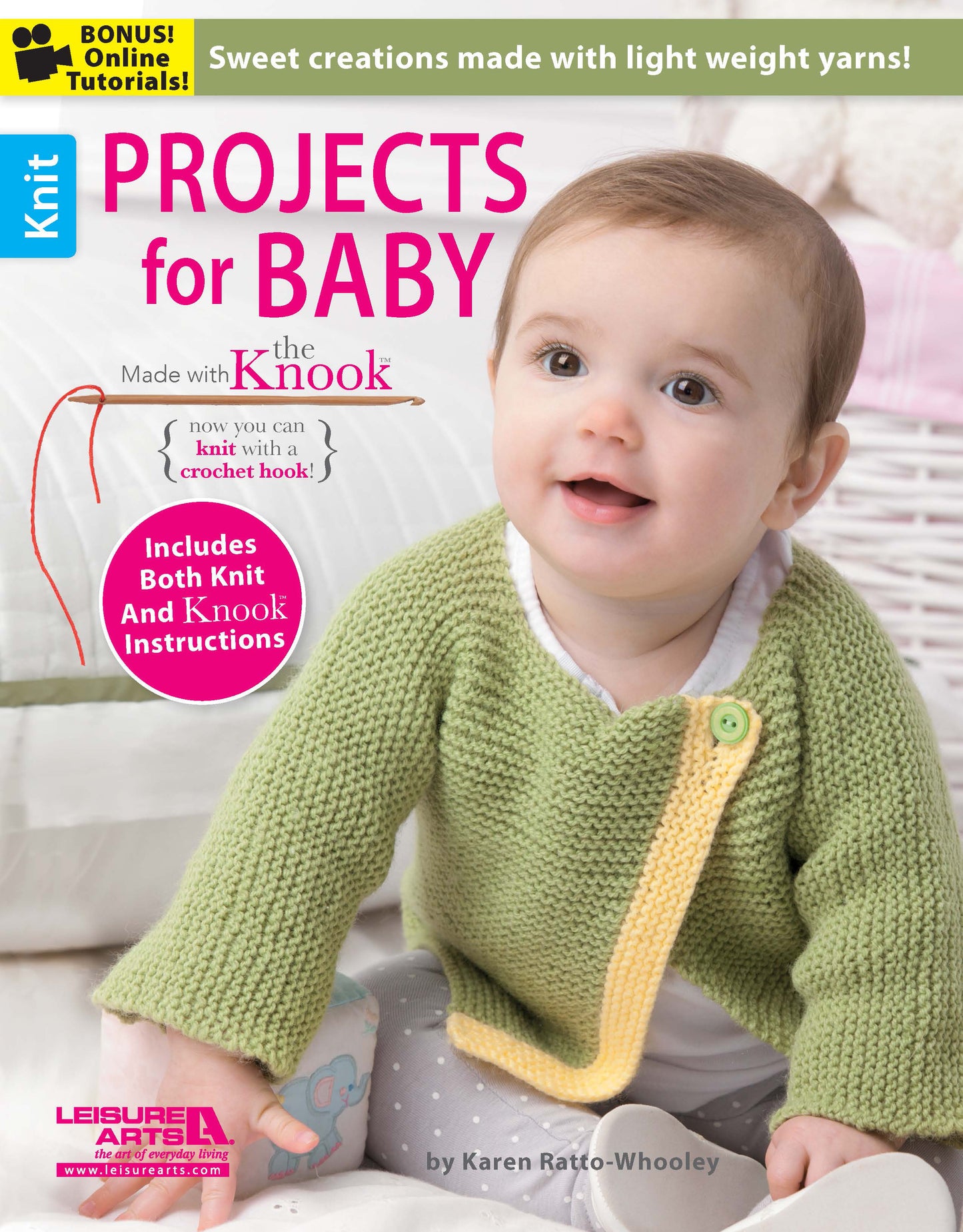 A baby in a green knitted sweater sits on a blanket. The magazine cover reads “Projects for Baby Made with the Knook” by Leisure Arts, featuring beginner baby knits and exclusive knooking instructions.