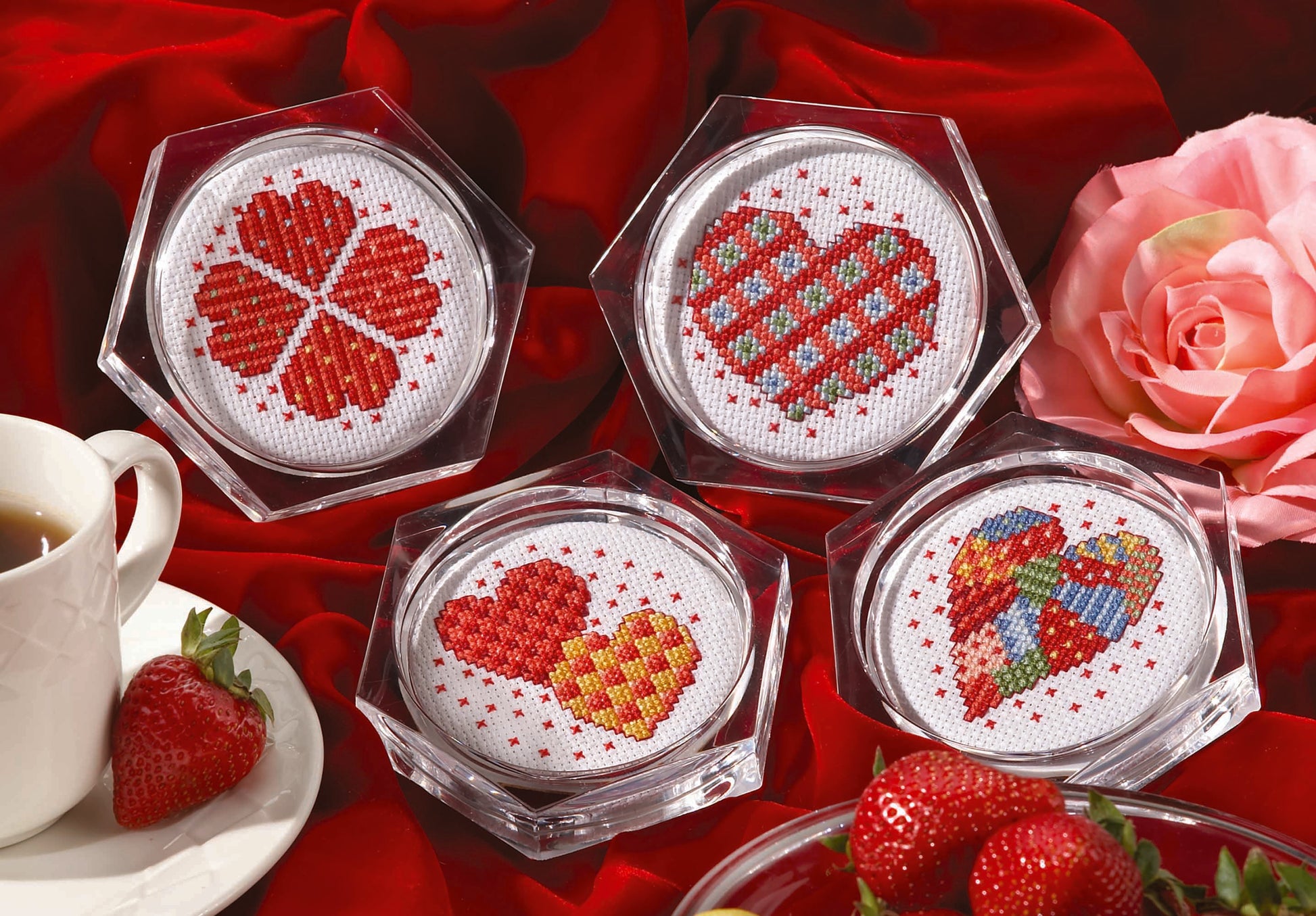 Leisure Arts' "Coasters—7 Cross Stitch Themes to Add Pizzazz to Your Home Decor" offers charming cross-stitched heart and floral coaster motifs, perfect inspiration for beginner cross stitch enthusiasts seeking creative décor ideas.