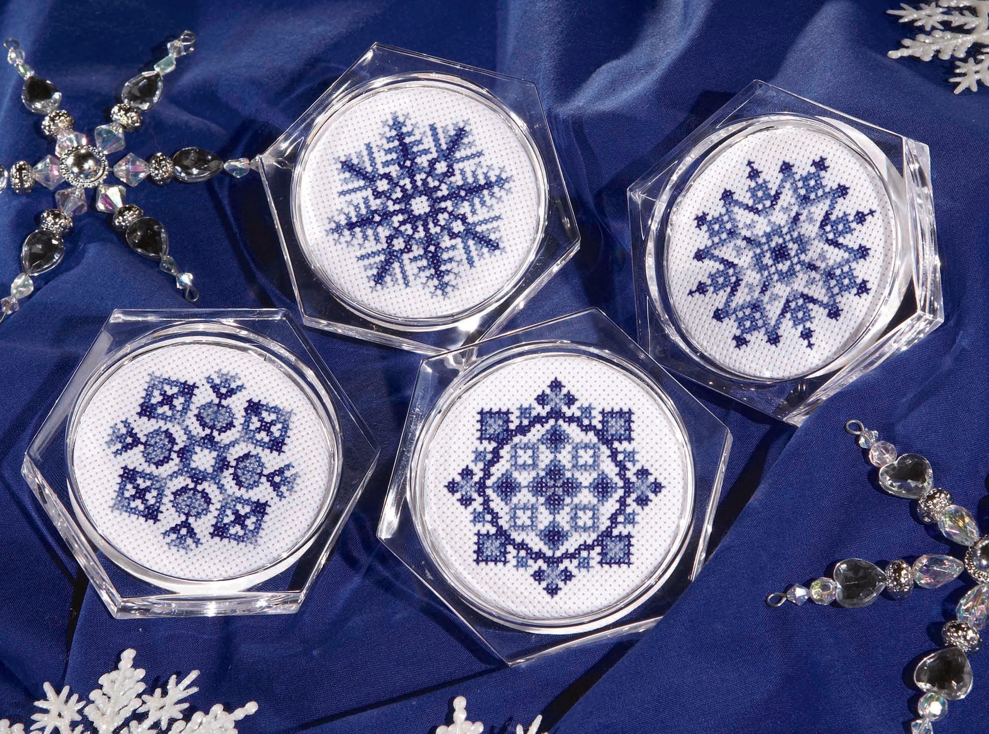 Leisure Arts’ Coasters—7 Cross Stitch Themes to Add Pizzazz to Your Home Decor features beautiful cross-stitched designs, perfect for showing off your stitching skills and brightening up any space.
