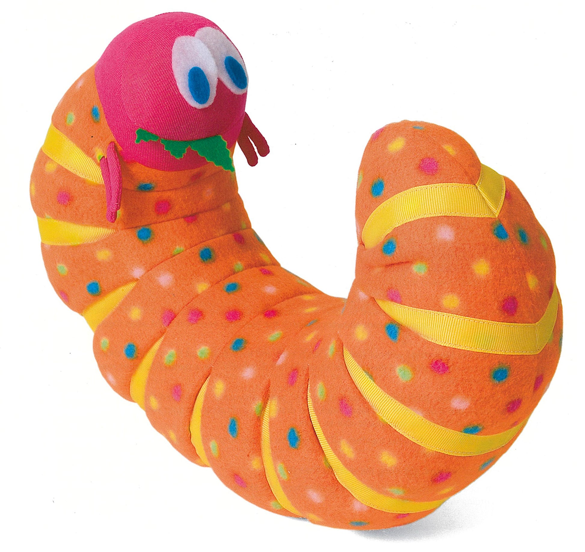 Accent your home with plush comfort and style using Leisure Arts’ Pillows—orange with colorful dots, yellow stripes, and a pink head with big eyes and a green leaf for playful inspiration in your next sewing project.