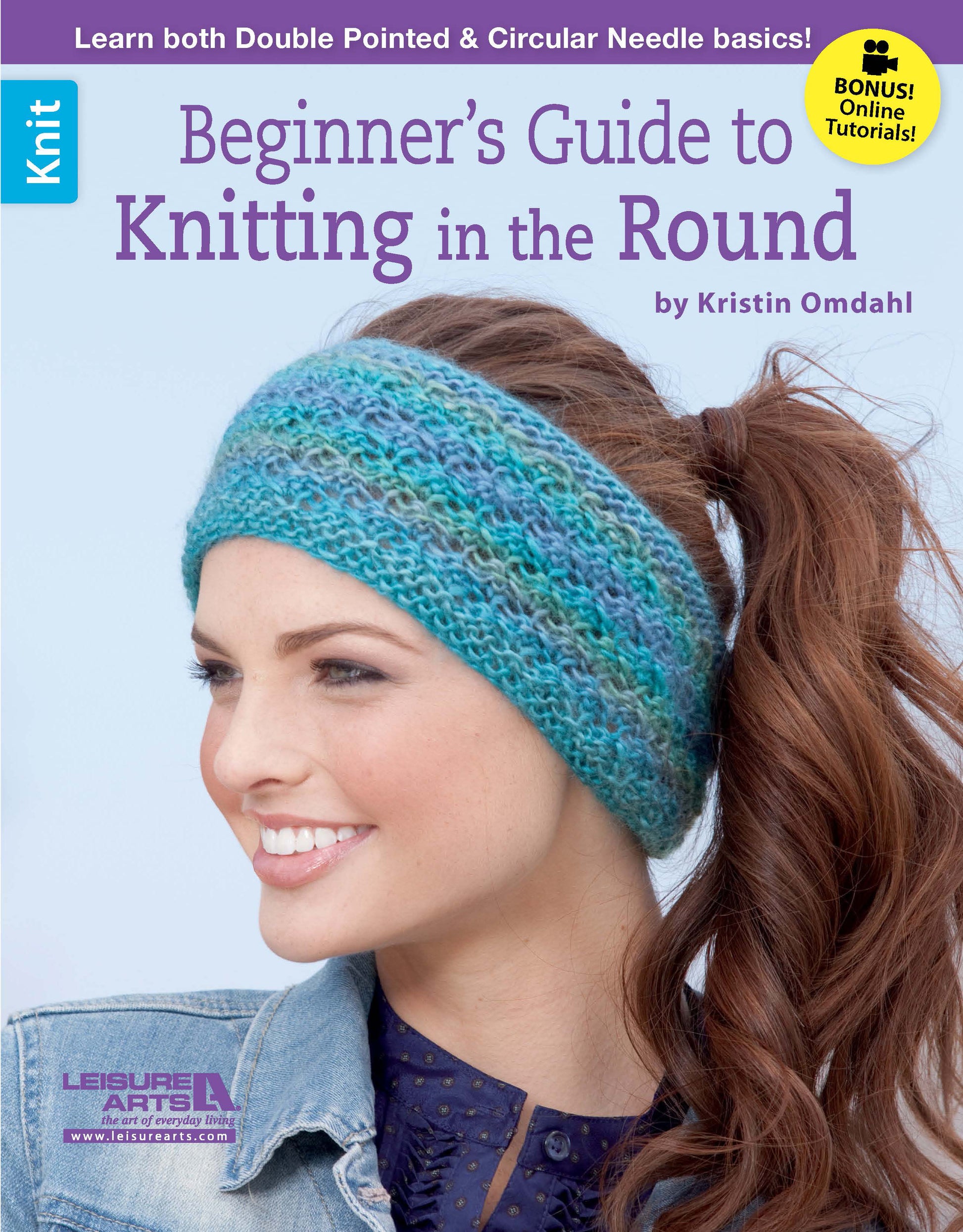 A smiling woman with long brown hair wears a blue and green headband. Cover text: Beginner's Guide to Knitting in the Round by Leisure Arts, with tips for circular knitting and access to online tutorials.