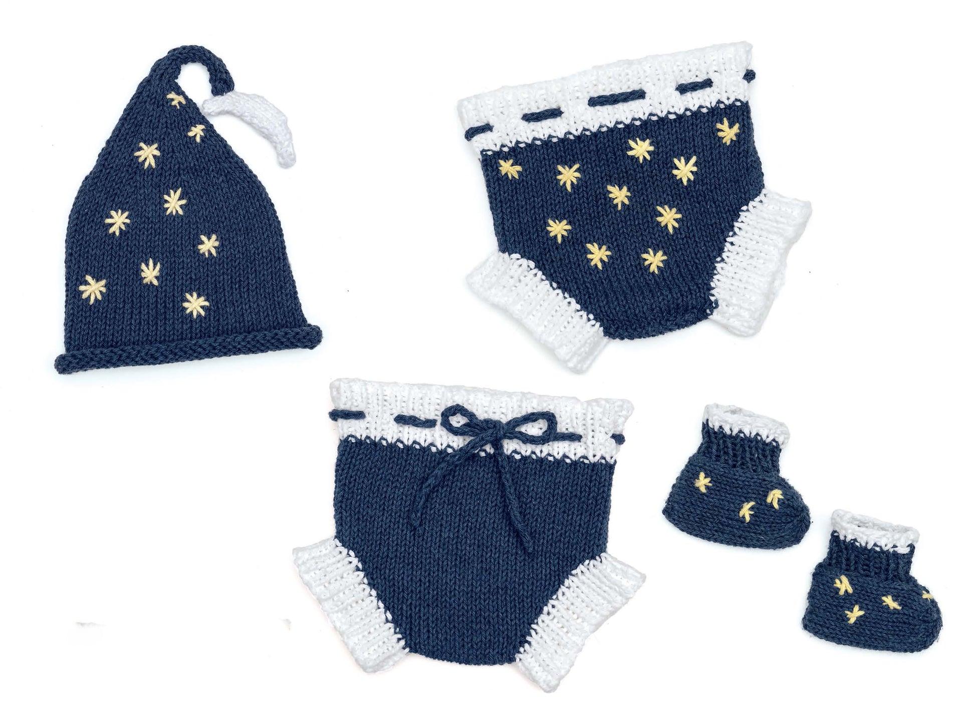 Leisure Arts Diaper Cover Sets—Fun Outfits for Baby Photos & Playtime! Includes a hand-knitted navy baby hat with white trim and yellow stars, two navy diaper covers with ties, matching booties, plus bonus online tutorials.