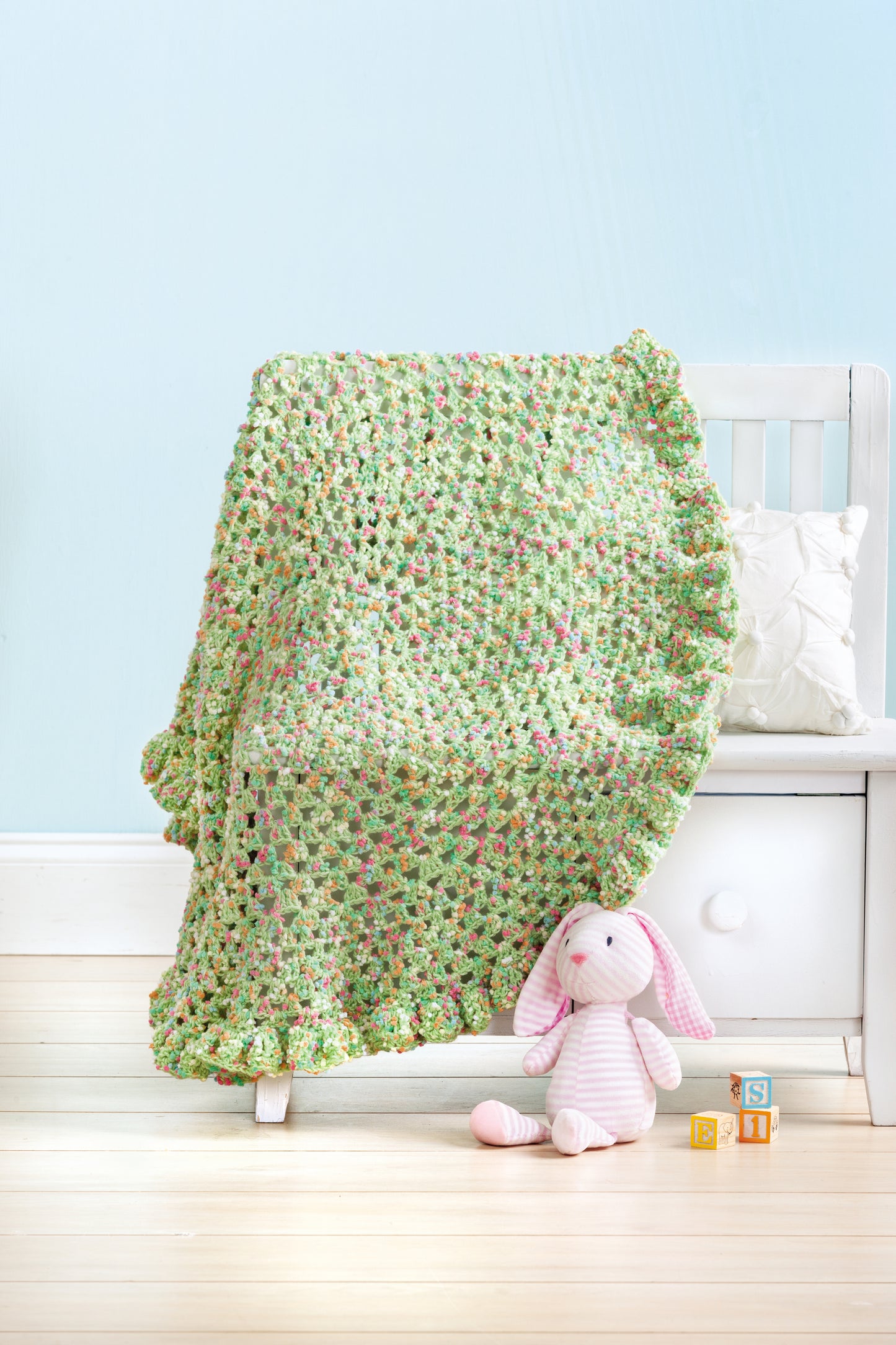 Add a sweet touch to baby crochet projects with patterns from the Crochet Refresher Digital Download by Leisure Arts—perfect for making pastel green and pink blankets, plush bunnies, and more.
