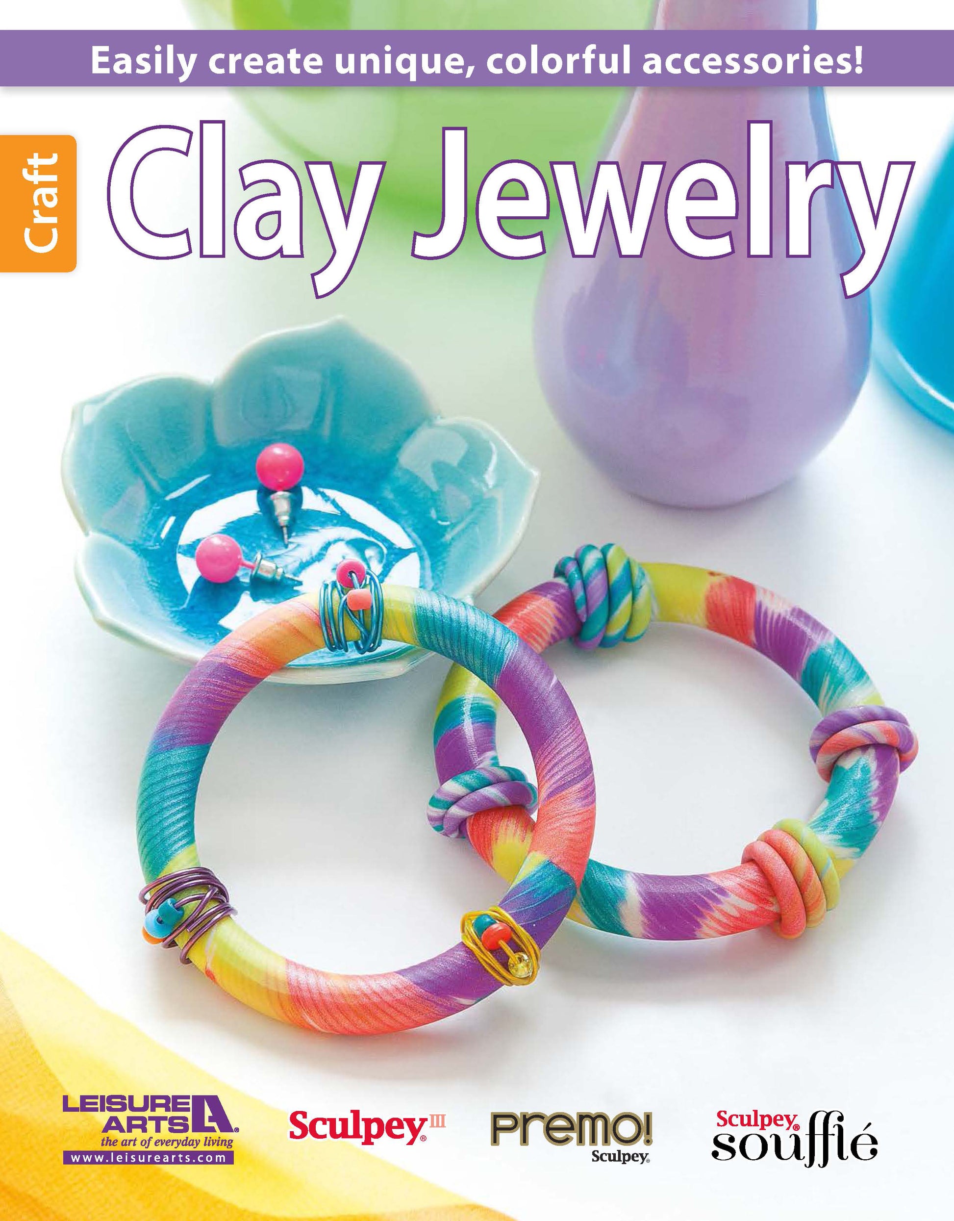 Colorful twisted oven-bake clay bangle bracelets and pink stud earrings by Leisure Arts, displayed in a blue flower-shaped dish with text reading "Clay Jewelry.