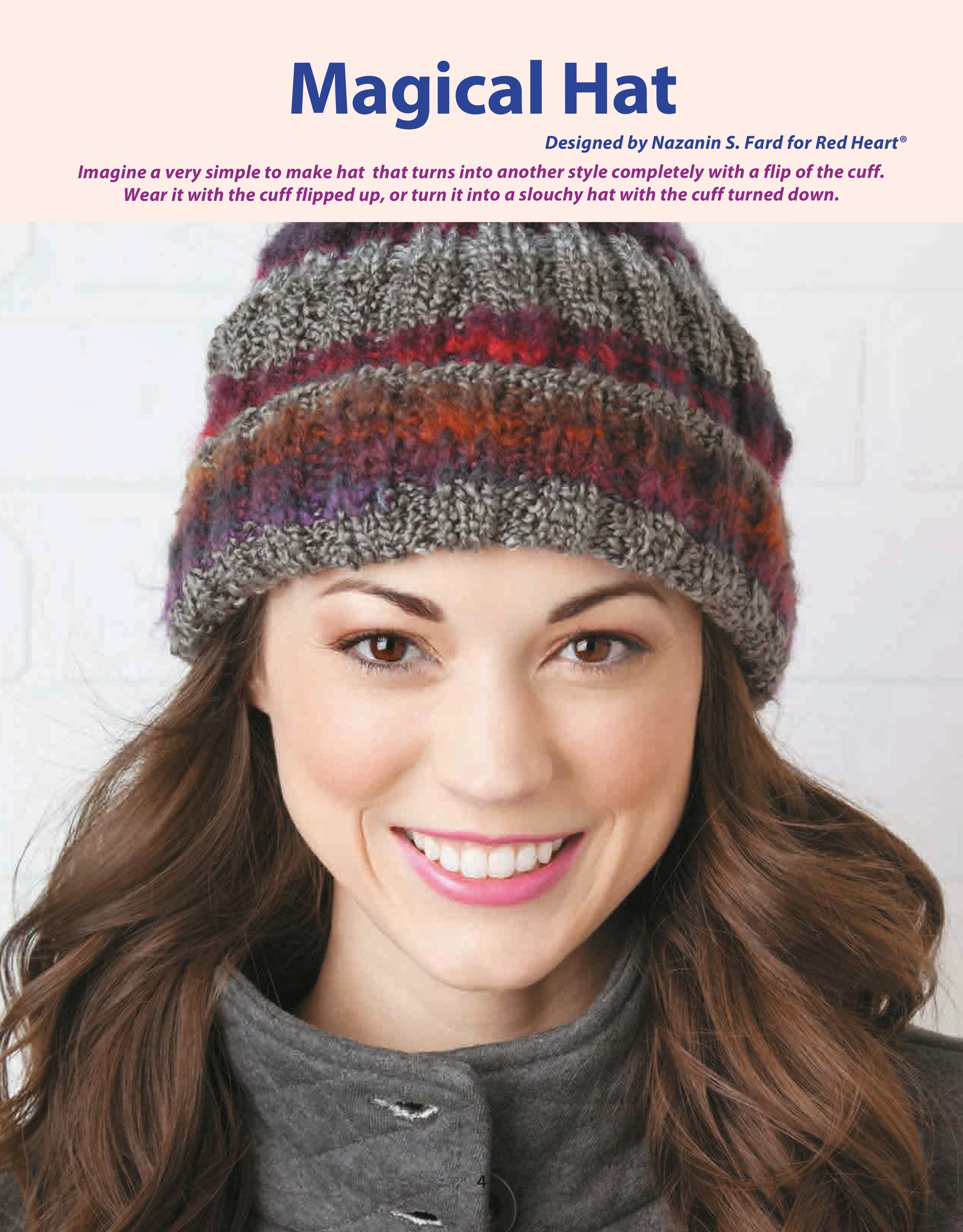 A woman with long brown hair wears a vibrant, chunky knit hat with a gray cuff—crafted using Beginner-Friendly Knitting patterns from Leisure Arts, perfect for cozy winter style and ideal for beginner projects.
