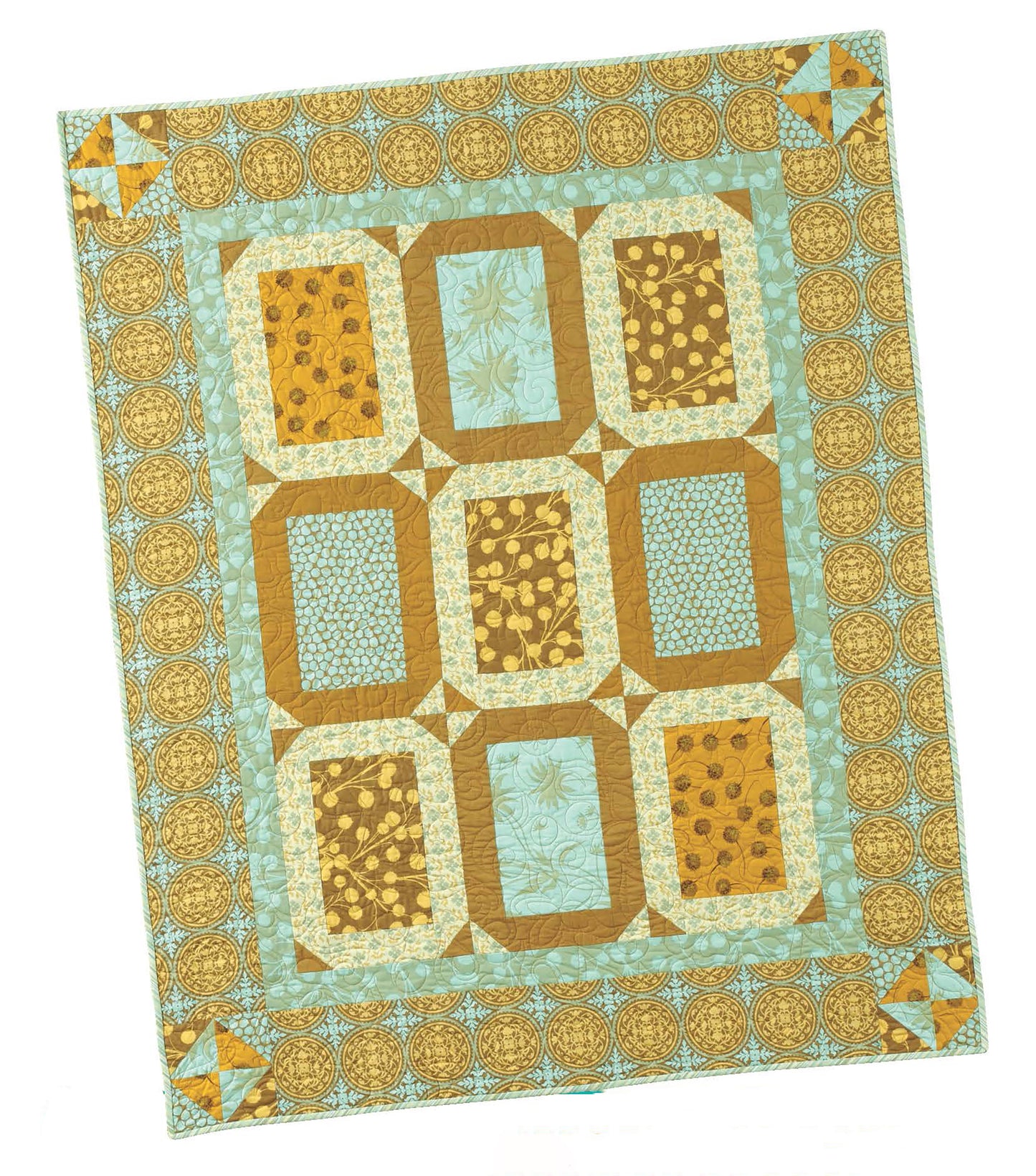 Big Block Quilts by Leisure Arts features nine rectangular blocks in brown, gold, and aqua tones with geometric borders—ideal for fat-quarter friendly quilting projects.