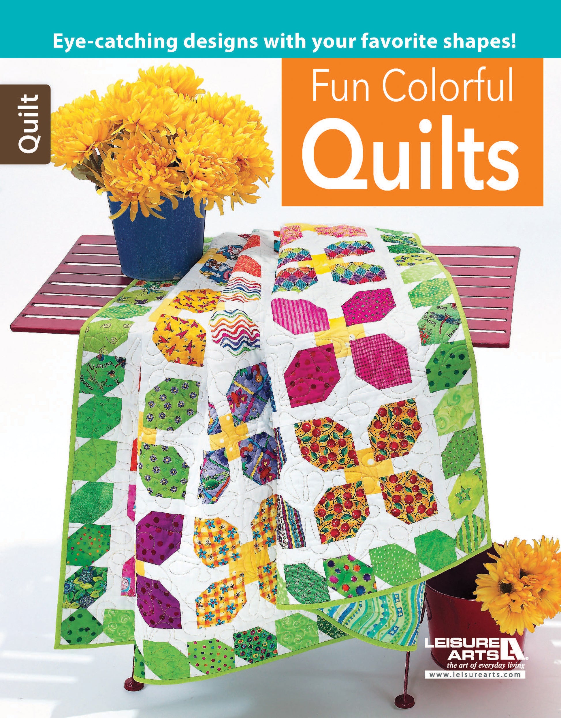A vibrant quilt with butterfly patterns lies on a red bench near a yellow potted flower. Featured is Leisure Arts' "Fun Colorful Quilts Digital Download," offering striking quilting designs and step-by-step instructions.