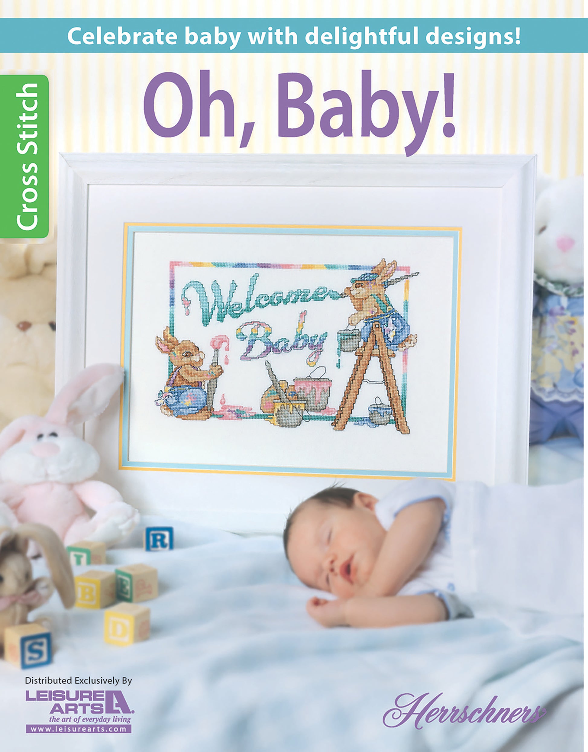 A sleeping baby is surrounded by soft toys and a blanket, in front of a framed cross stitch design with rabbits, pastels, and “Welcome Baby.” The text reads: Oh, Baby! Digital Download by Leisure Arts.