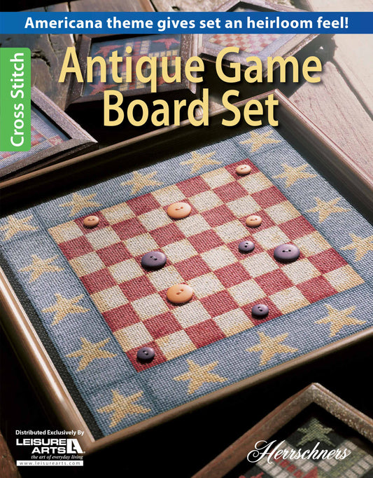 A cross-stitched game board from Leisure Arts with a blue and red checkered pattern, yellow star border, and round pieces. Text reads “Antique Game Board Set”—an heirloom inspired by classic designs.