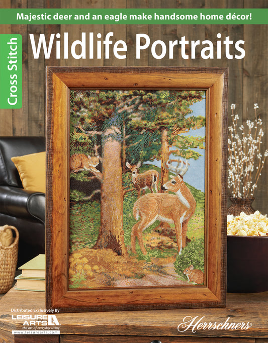 The Cross Stitch Wildlife Portraits booklet by Leisure Arts features a framed deer in a forest with an eagle overhead—an ideal choice to create standout home decor.