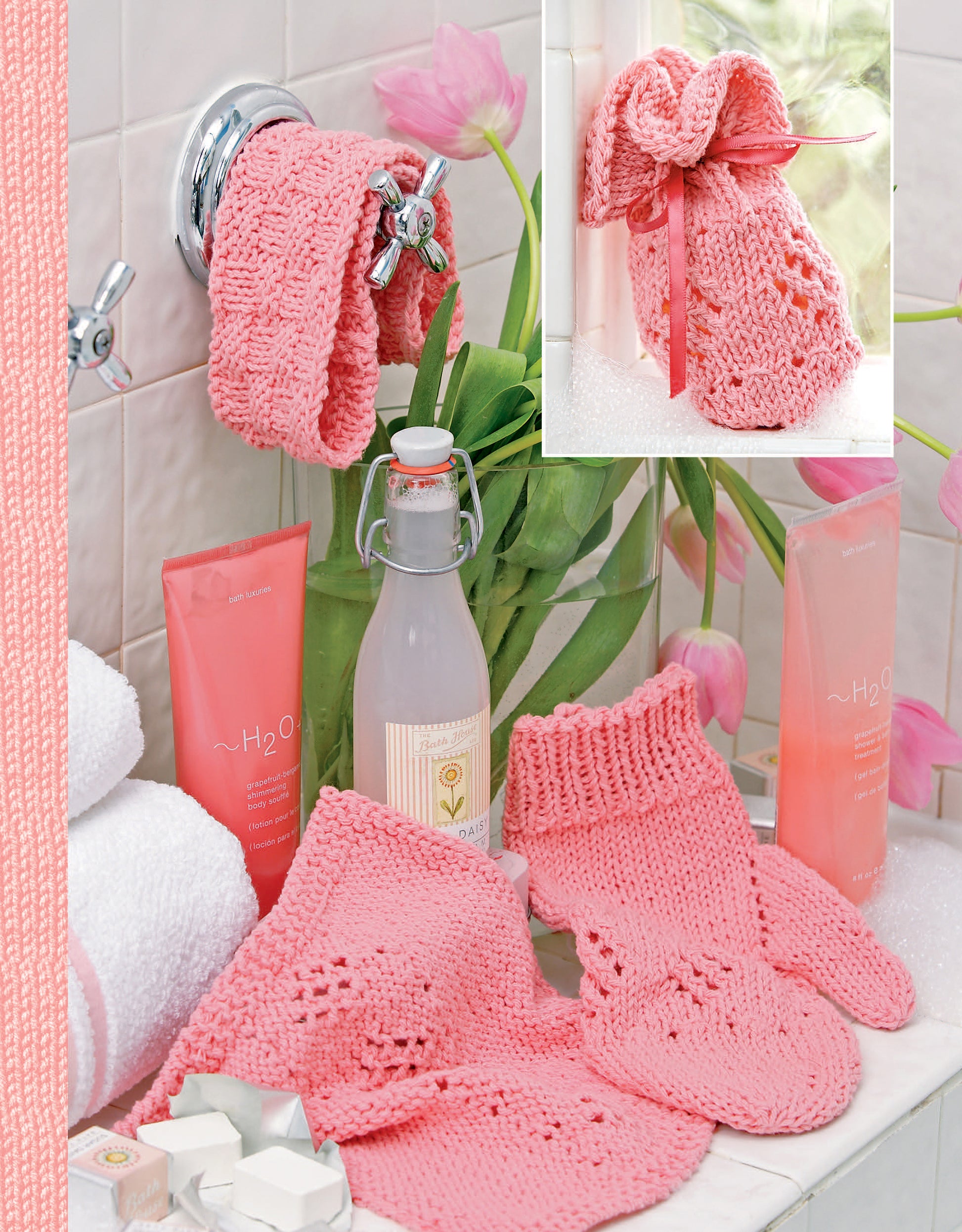 A spa-themed bathroom scene features pink knit washcloths, socks, a bath mitt, and a soap pouch made with Spa & Bath Sets to Knit by Leisure Arts. Shown with bath products, towels, tulips, and decorative soaps. Inset: close-up of ribbon-tied soap pouch.