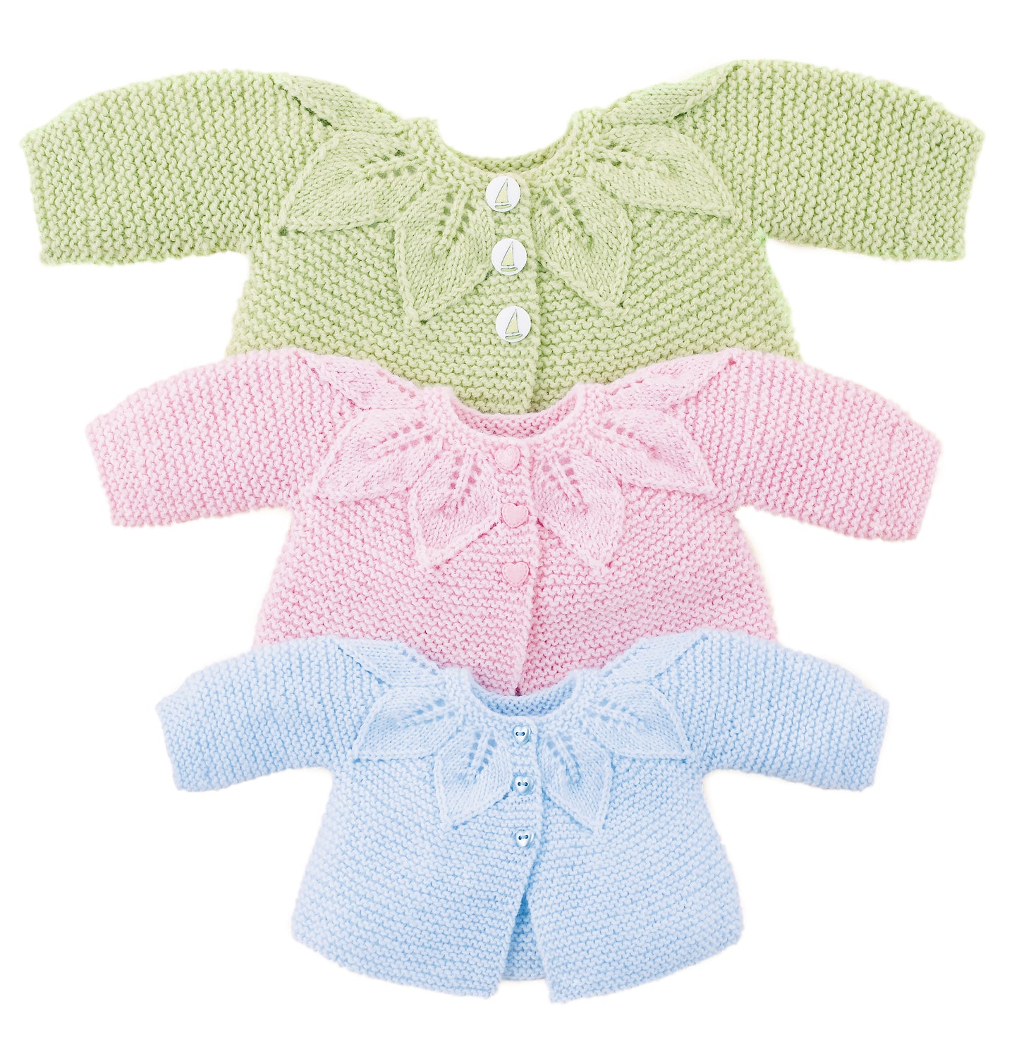 Three baby cardigans from Leisure Arts' Lace & Leaves for Baby are stacked—green, pink, and blue—each with a leaf yoke design, making them perfect for your baby layette knitting pattern collection.