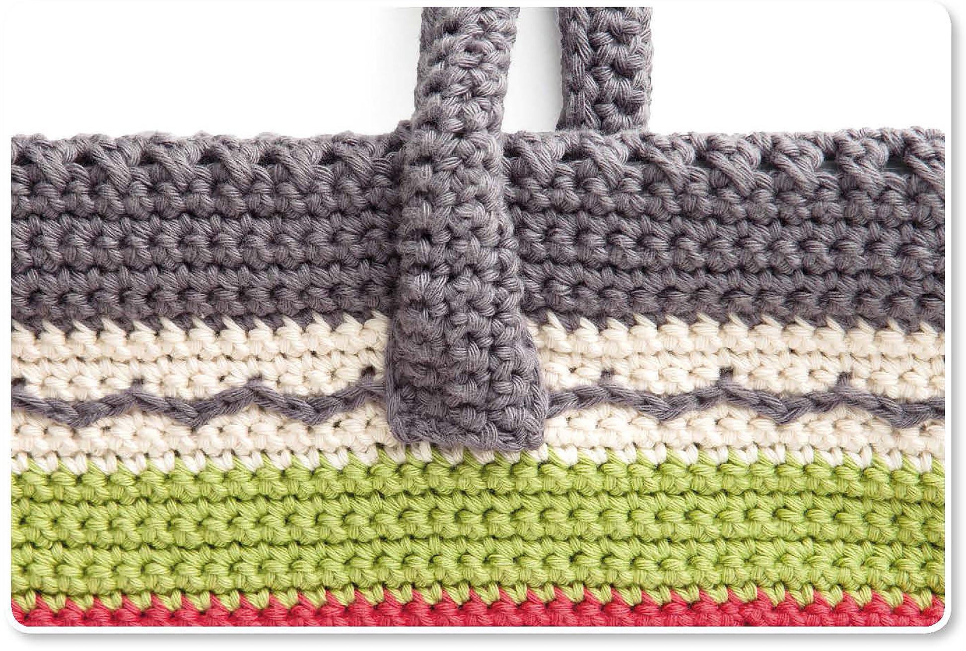 Close-up of a crocheted bag in grey, white, green, and pink stripes inspires creative patterns. Find this and more in "Crochet Terrific Totes—Dress to Impress With Distinctive Bags! Digital Download" by Leisure Arts.