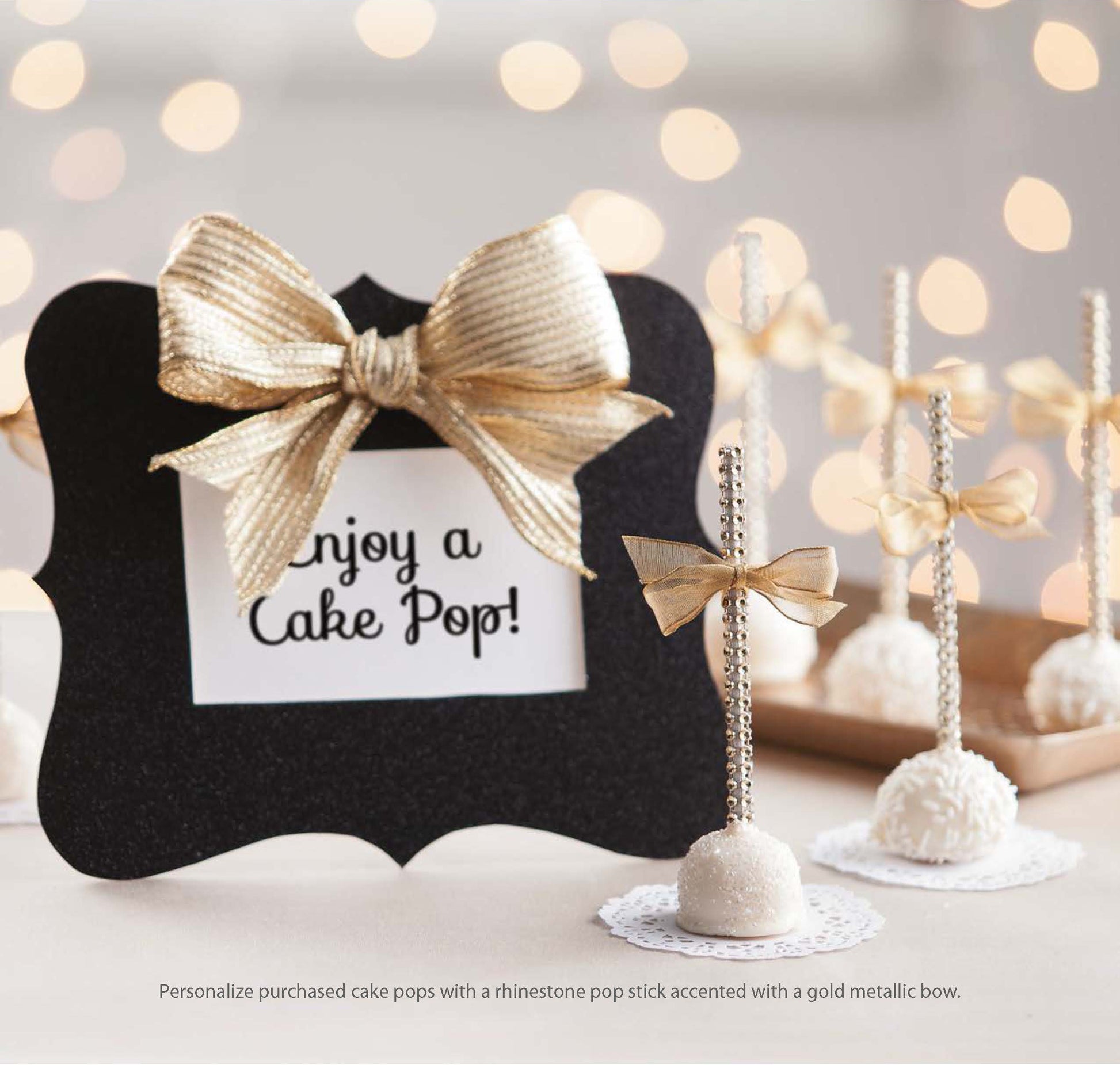 The Glam Wedding Favors Digital Download by Leisure Arts features white cake pops with rhinestone sticks and gold bows, arranged on lace doilies—perfect as DIY wedding favors or budget-friendly gifts.