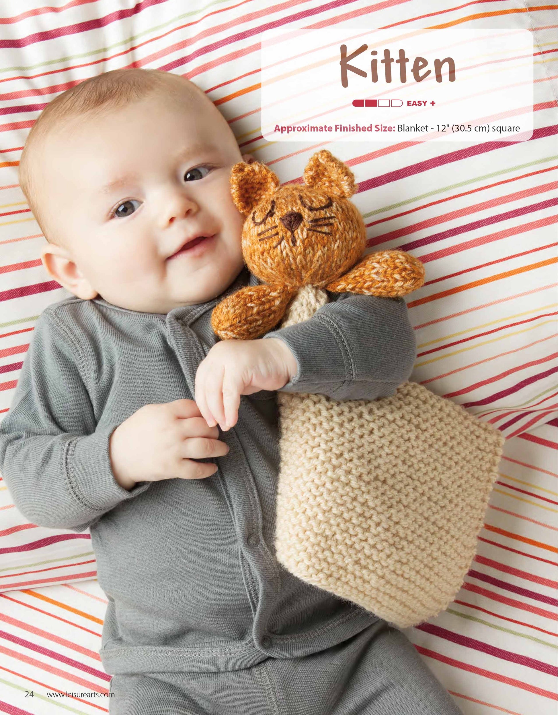 A baby in a gray onesie smiles on a red, yellow, and white striped blanket, holding an Animal Lovies—Huggable Blanket Buddy by Leisure Arts. Text above reads Kitten and offers a beginner knitting pattern and bonus online tutorials for this adorable gift.