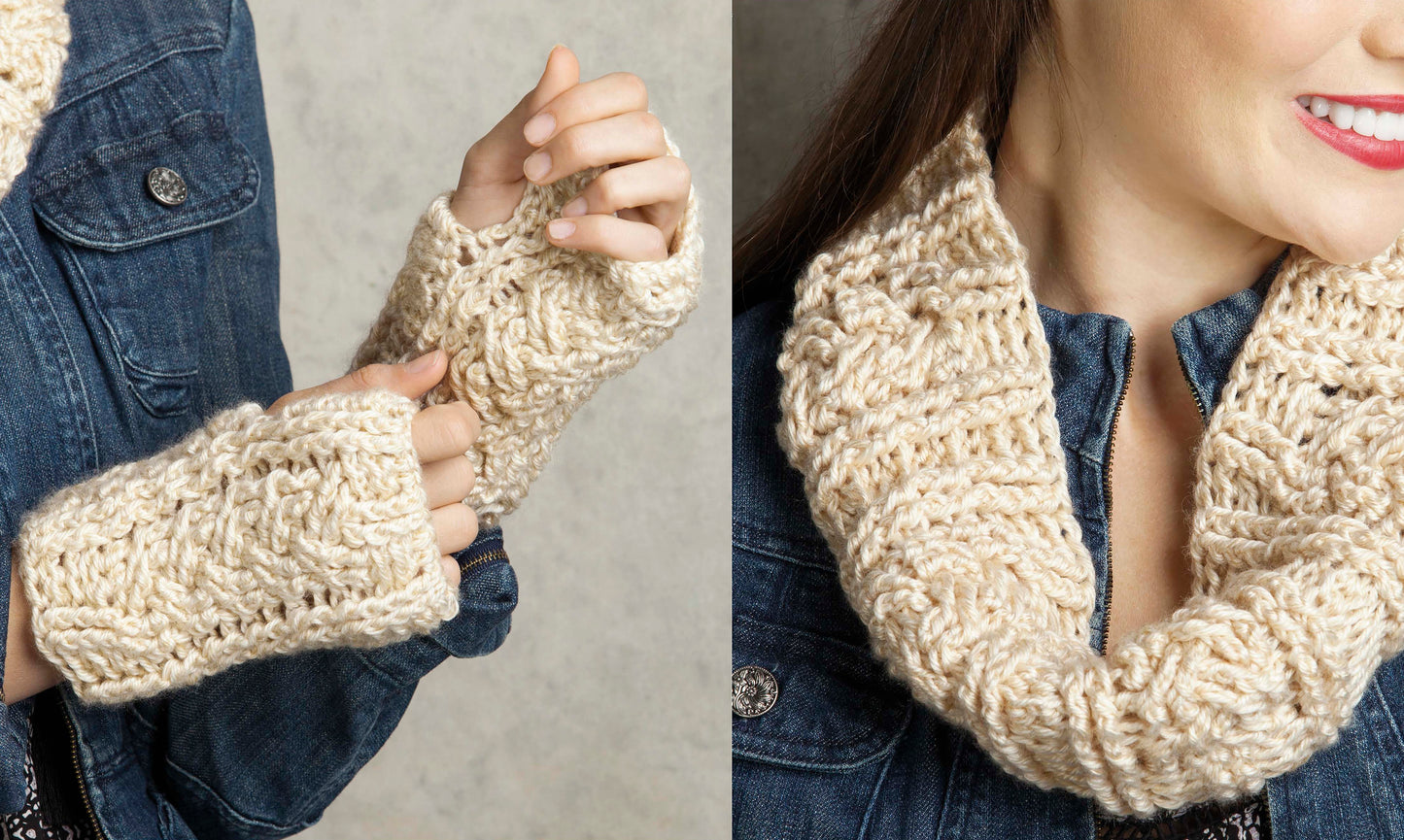 A woman in a blue denim jacket models chunky, cream-colored fingerless gloves and a matching cowl scarf from Leisure Arts' "Crochet Caps, Cowls & Mitts," showing off the textured yarn in close-up and mid-range views.