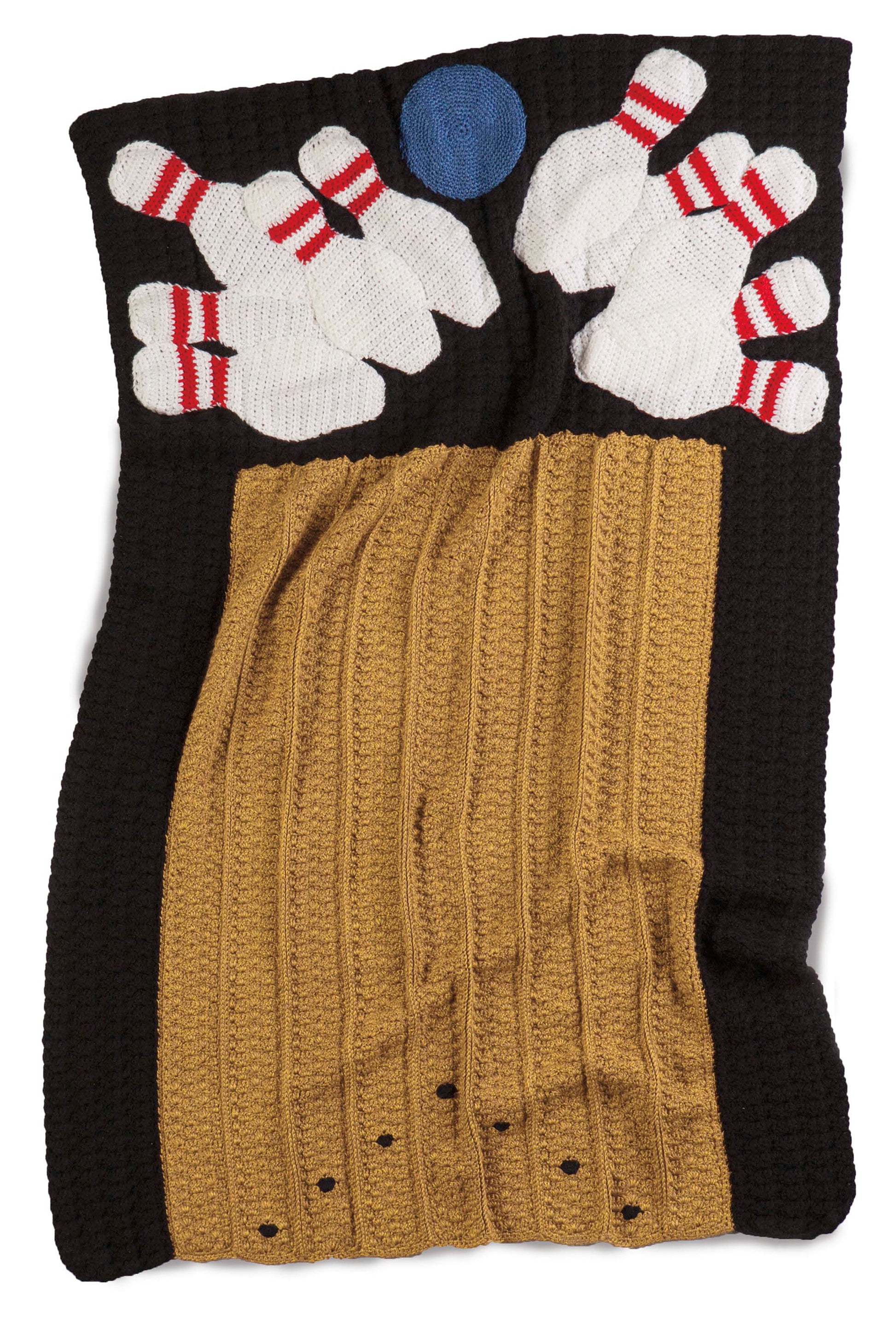 The Sportacular Afghans to Crochet Digital Download by Leisure Arts features a sports-inspired knitted blanket designed like a bowling lane, with a blue ball hitting white pins—ideal man cave decor.