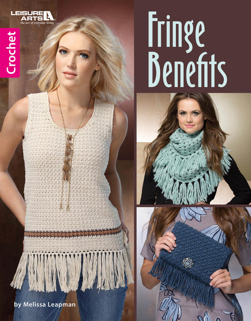 Cover of "Crochet Fringe Benefits" by Leisure Arts features a woman in a fringed tank top, another with a fringed scarf, and hands holding a fringed clutch. Ideal for beginner projects by Melissa Leapman.