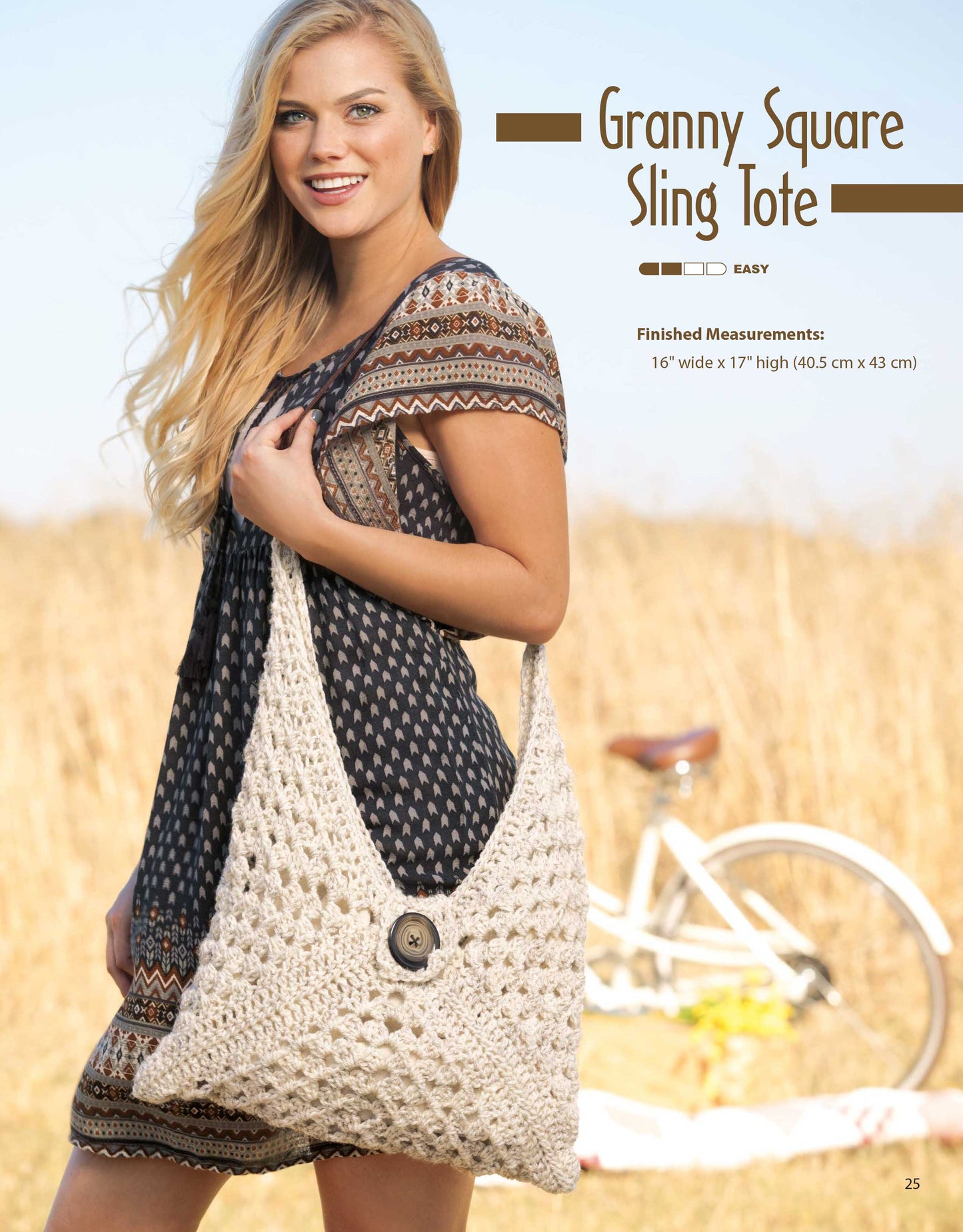 A smiling woman stands in a field with a crocheted beige tote bag featuring a large button, ideal for beginners. A white bicycle is behind her. Text reads: Crochet Rucksacks & Backpacks Digital Download by Leisure Arts.