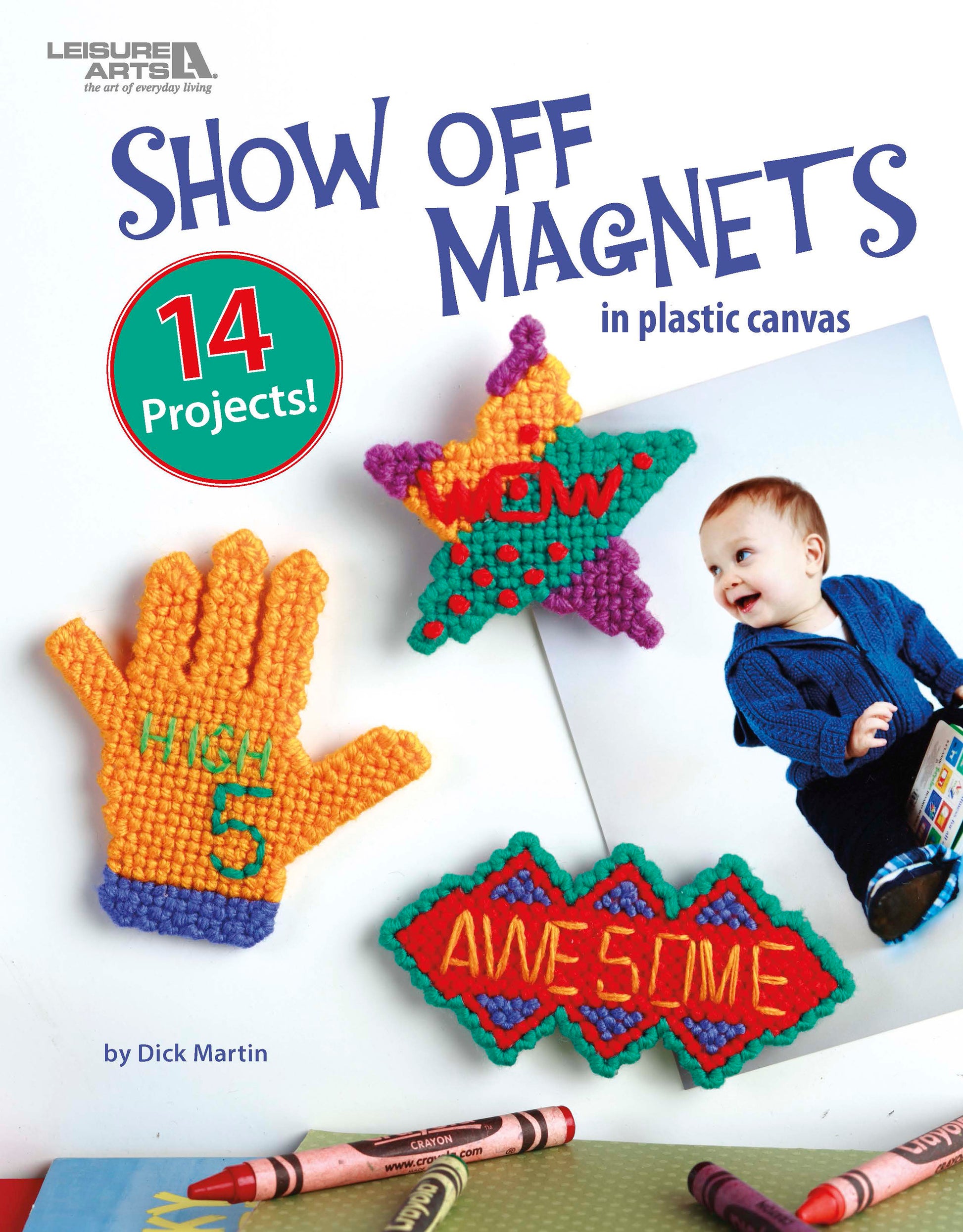 Cover of Leisure Arts’ “Show Off Magnets in Plastic Canvas” shows colorful hand, star, and sign-shaped magnets plus a smiling baby with crafts—great for family photos. Text highlights 14 projects included!.