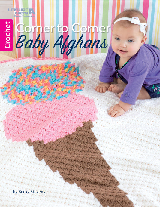 A baby in a purple outfit and white headband sits on a crocheted blanket with a colorful ice cream cone design from the Leisure Arts “Corner to Corner Baby Afghans” collection—an adorable, easy crochet pattern for a car blanket.