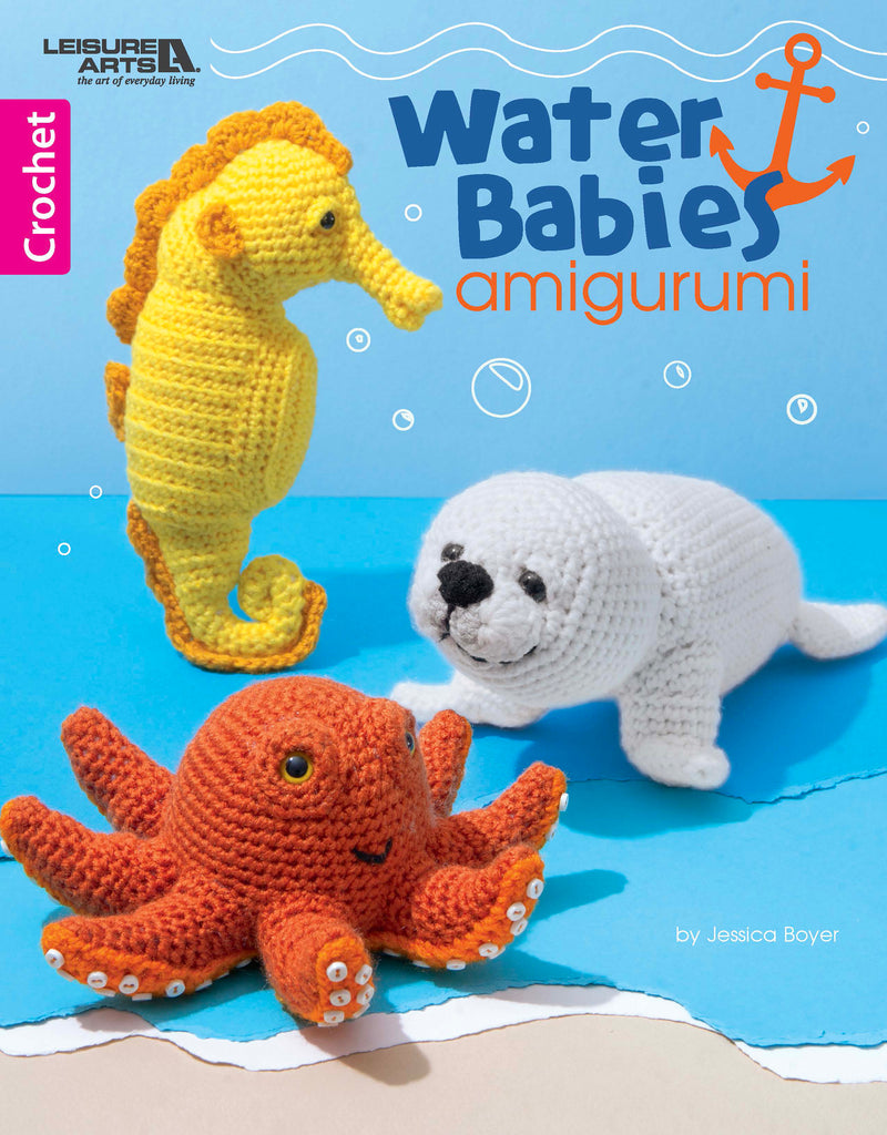 Cover of Water Babies Amigurumi by Leisure Arts, showcasing easy crochet patterns for ocean animals: a yellow seahorse, white seal, and orange octopus on a blue background.