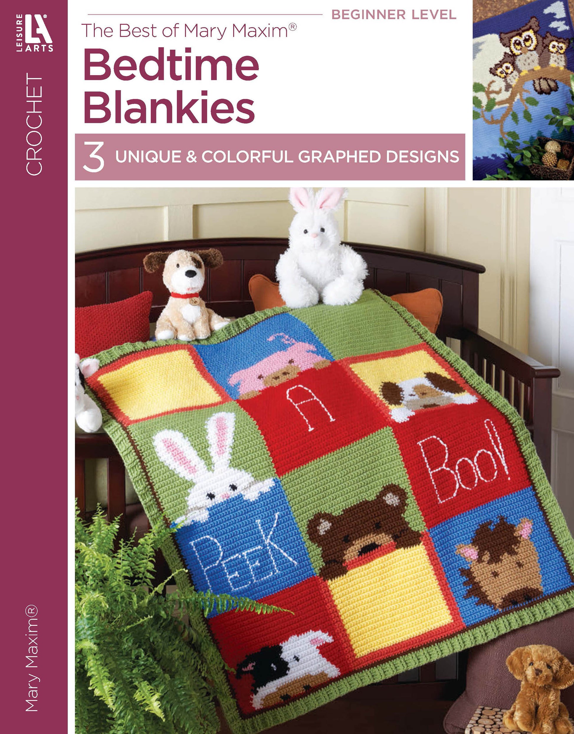 The Leisure Arts Crochet Bedtime Blankies, featuring animal faces and “A Peek A Boo!” text, is draped over a crib with plush toys. This colorful baby afghan is an easy, beginner-level crochet project.