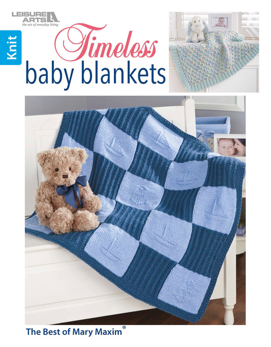 Cover of "Timeless Knit Baby Blankets" by Leisure Arts, showing a blue checkerboard baby blanket on a crib with a teddy bear and small images of other Leisure Arts knitting patterns in various yarn weights.