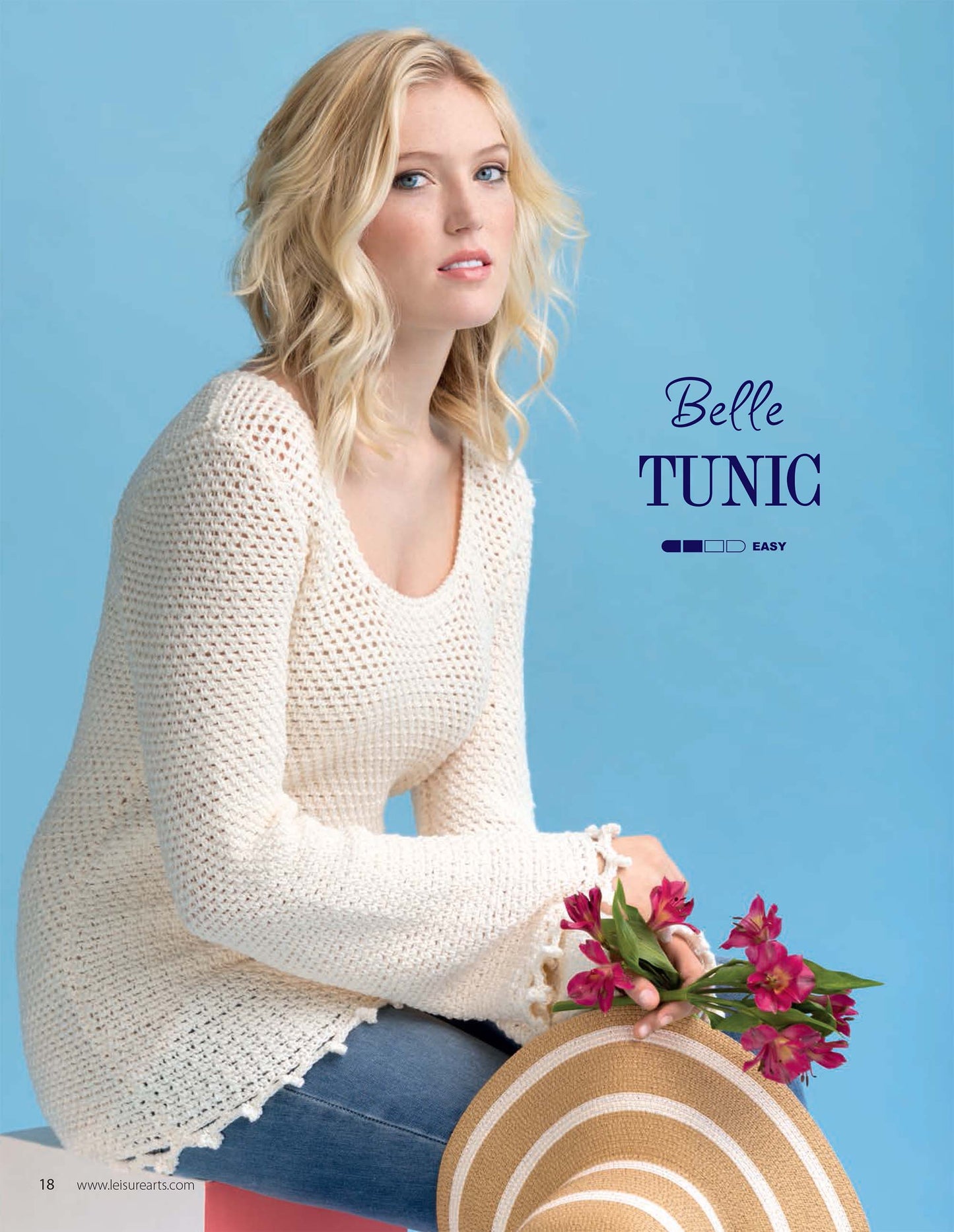 A blonde woman in a cream crochet tunic and blue jeans holds a straw hat with pink flowers, sitting against a light blue backdrop. Text reads Crochet Super Simple Summer Tops by Leisure Arts—an easy crochet project for women.