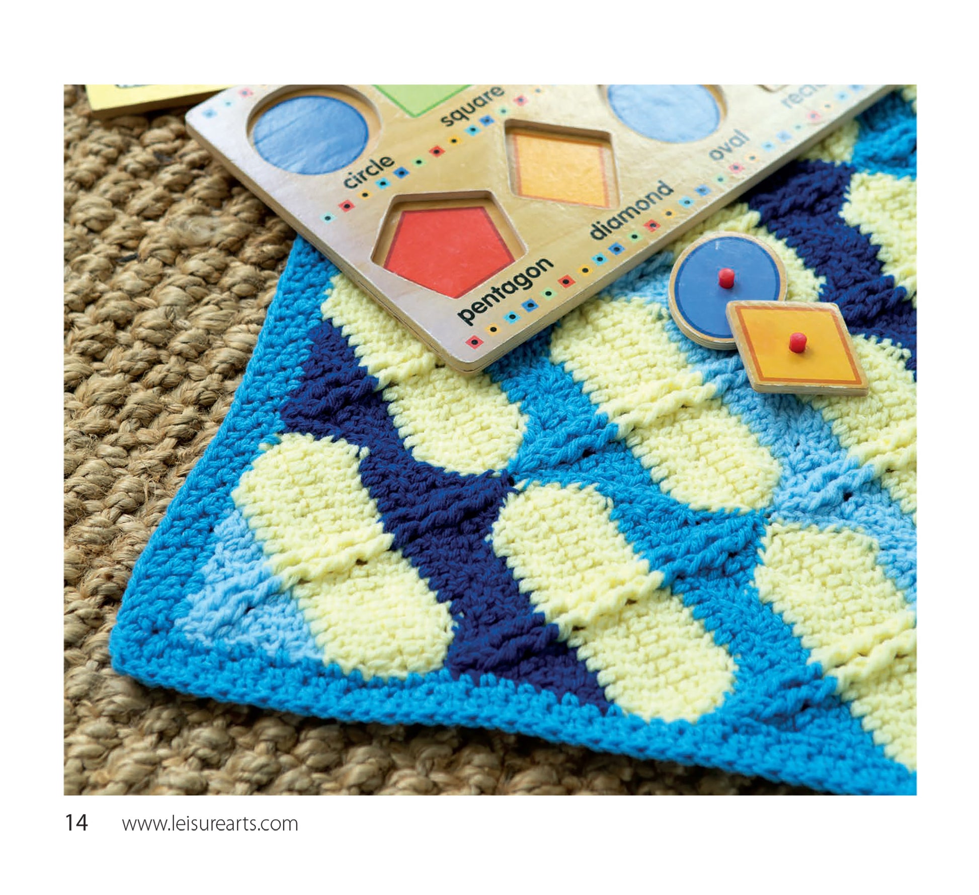 The Baby Bright Quilts by Leisure Arts, featuring pops of blue, yellow, and light blue in easy crochet patterns, rests on a woven surface beside a wooden puzzle with various shapes.