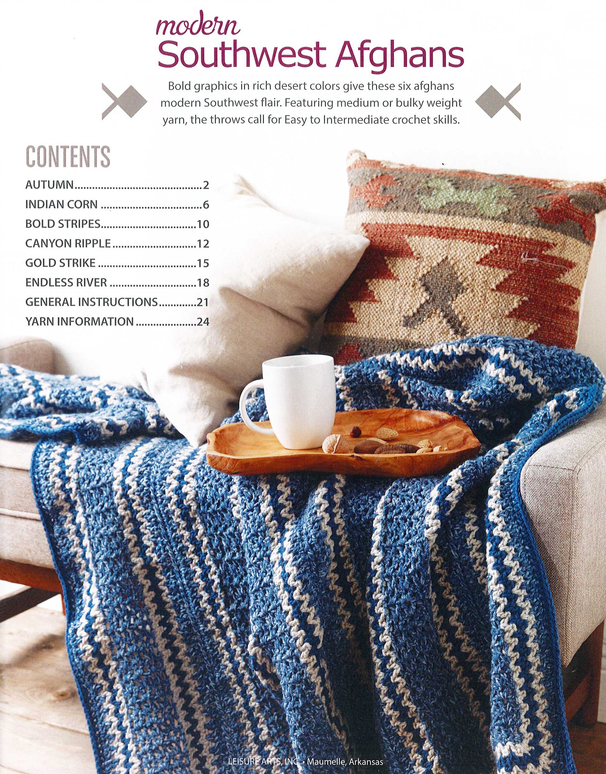 A cozy setting features blue and white striped crochet throws, a wooden tray with a white mug, and a Southwestern-patterned pillow. Overlaid on the image is the table of contents for "Modern Southwest Afghans" by Leisure Arts.