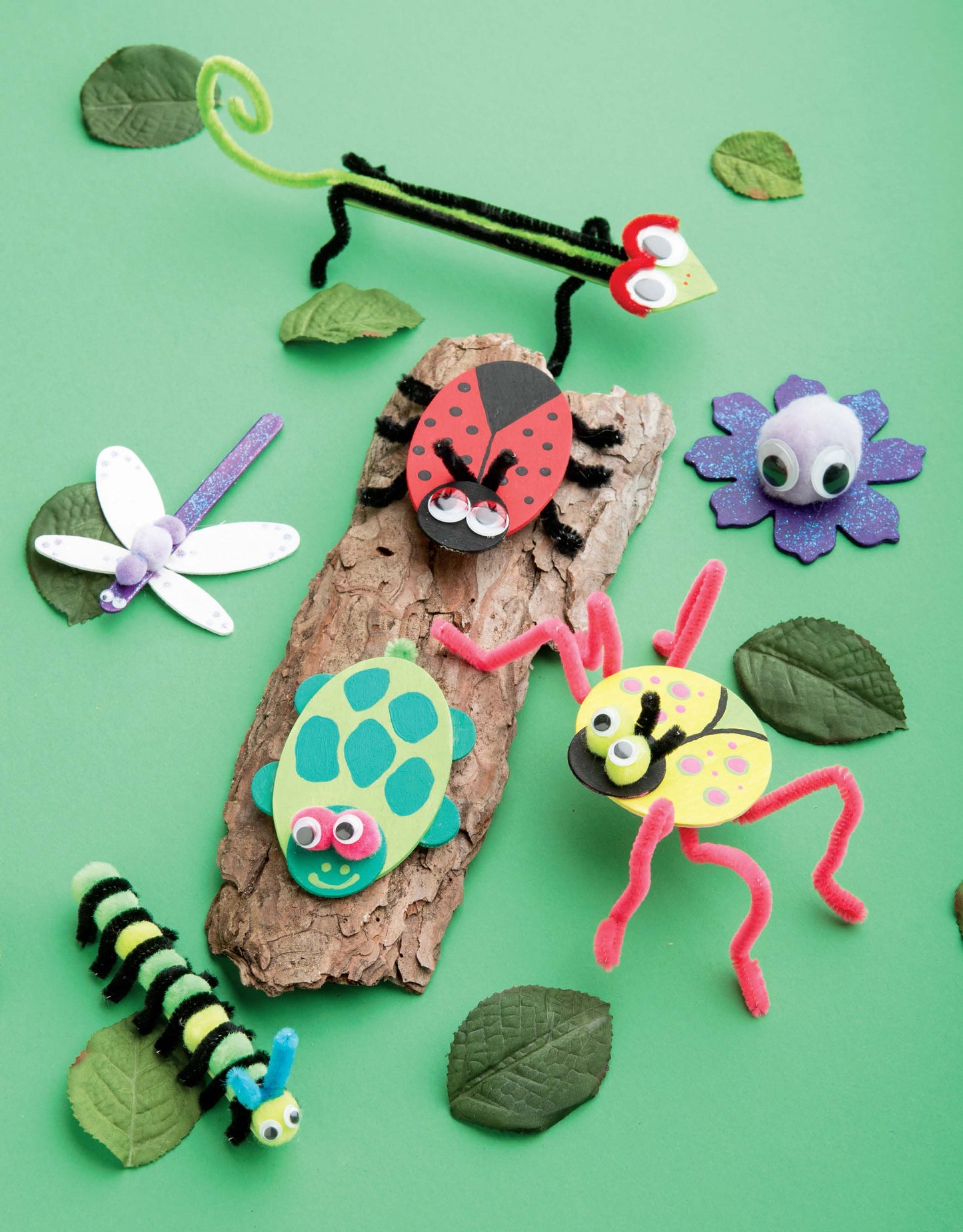 Leisure Arts' DIY Simple Kids' Crafts features colorful, handmade insect crafts from foam, pipe cleaners, and googly eyes on a green background—perfect inspiration for children's art projects or creative activities.
