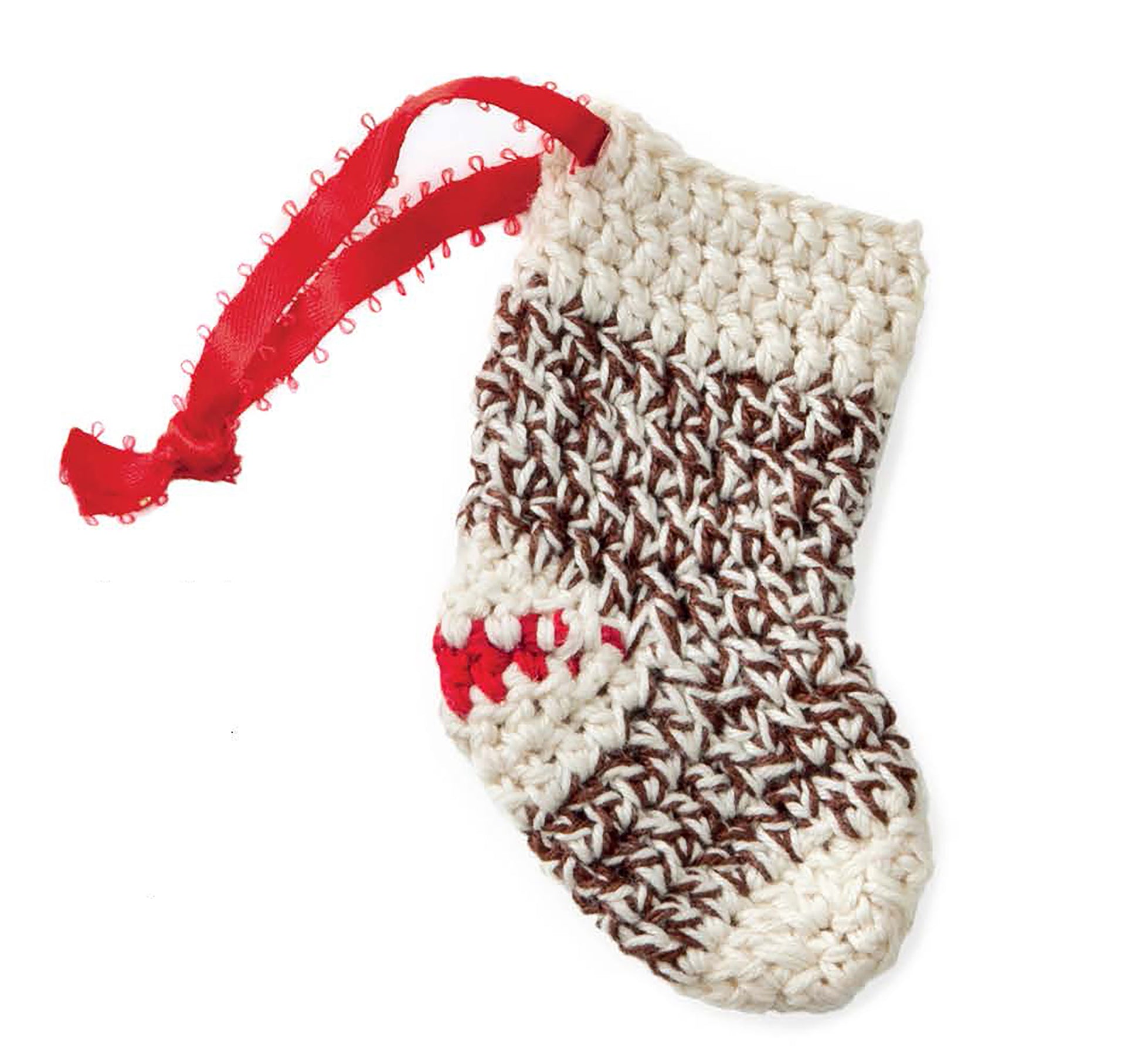 The Leisure Arts Crochet Thread Christmas Ornaments Digital Download features a small crocheted stocking with cream and brown yarn, a red heart near the heel, and a red ribbon loop—ideal for easy holiday crafts or mini decorations.