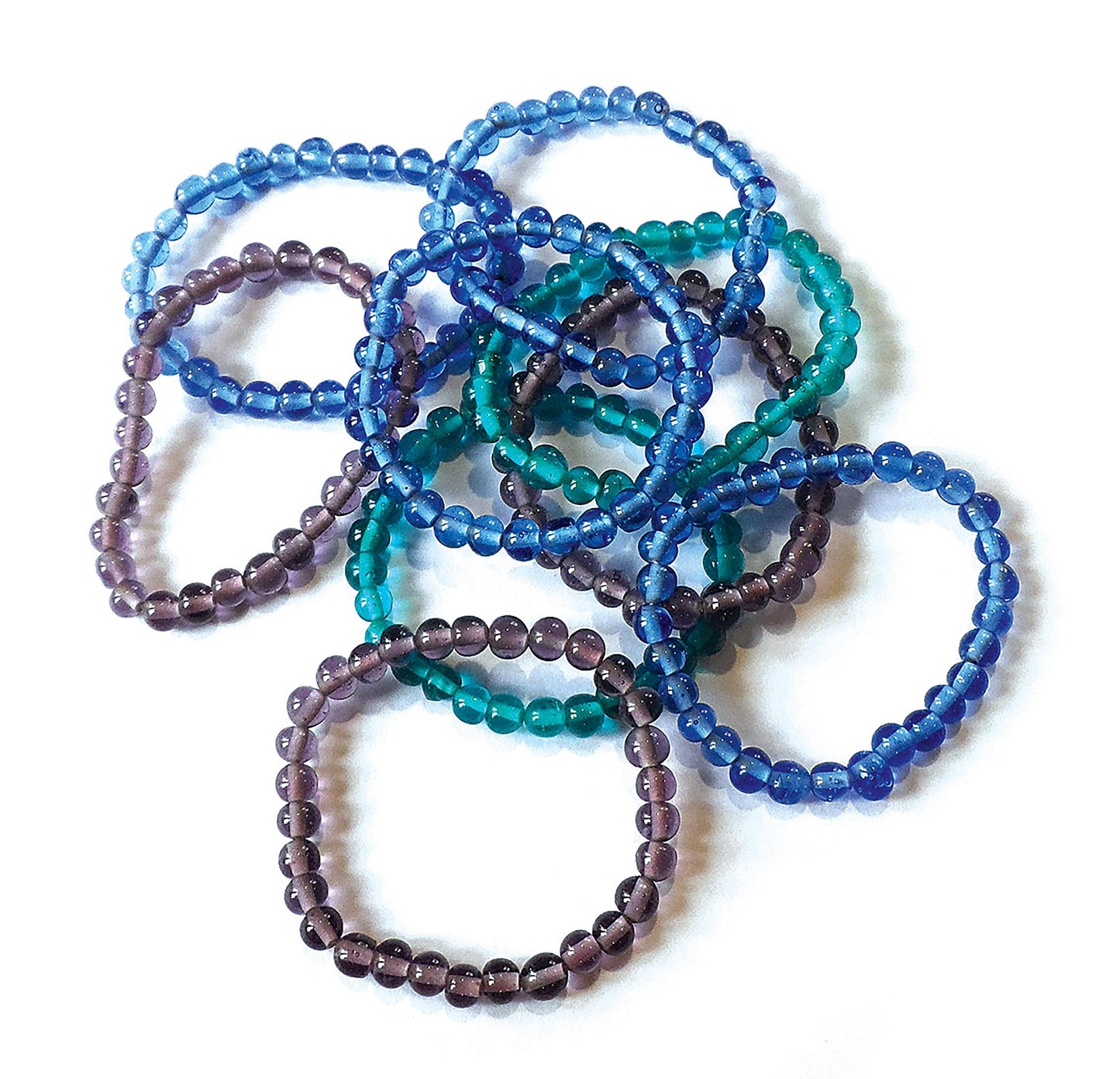 The Quick & Simple Jewelry Beading for Beginners set by Leisure Arts includes nine blue, teal, and purple beaded bracelets. Made with small, round, translucent beads, they’re ideal starter projects for those new to bracelet making.
