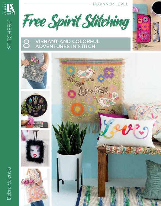 Cover of “Free Spirit Stitching” by Leisure Arts, a beginner-friendly book featuring needlework projects inspired by retro Bohemian embroidery—such as a floral pouch, cactus hoop art, colorful Love pillows, and a Love Nest wall hanging with birds and flowers.