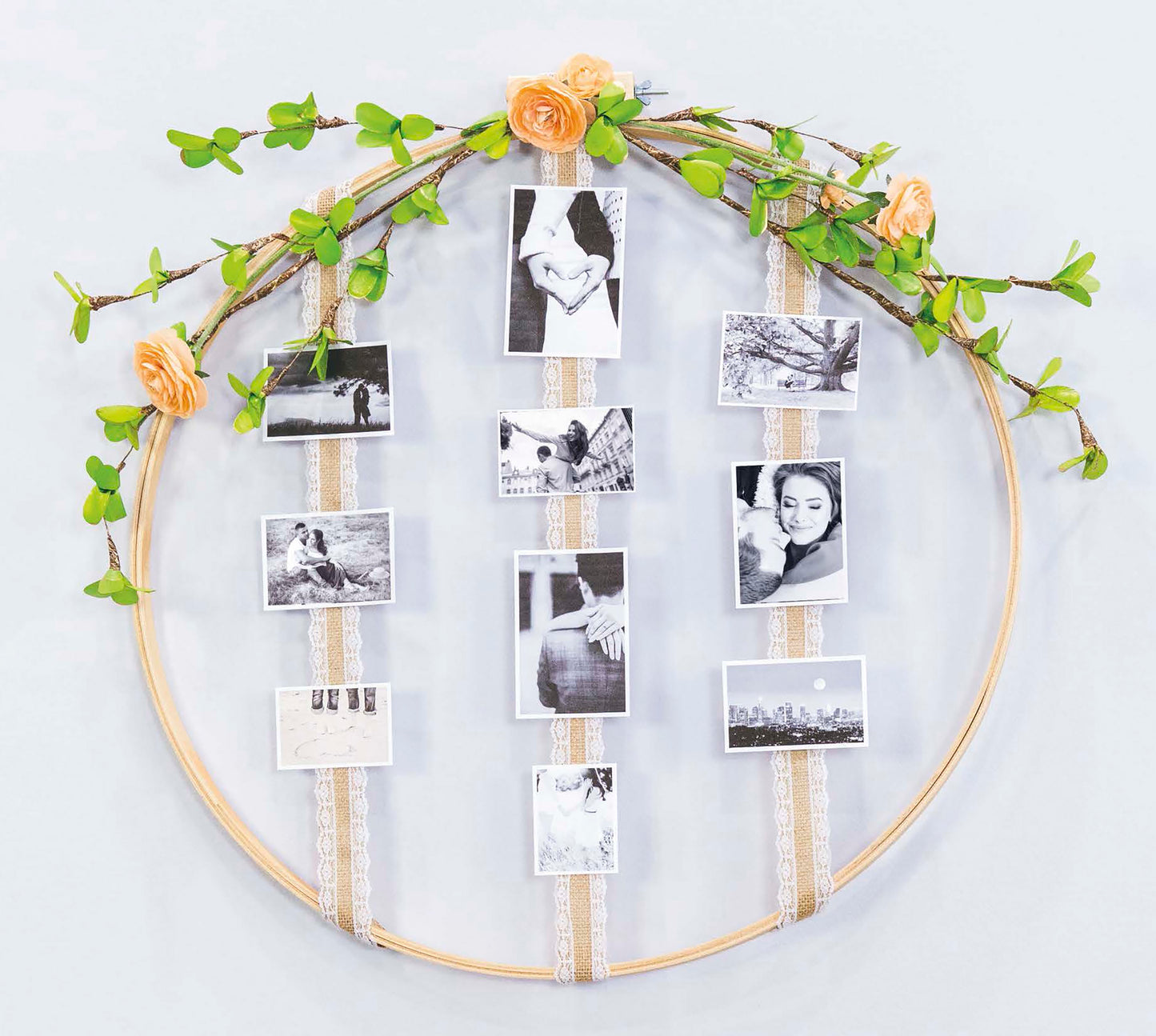 The Handmade Wedding by Leisure Arts features a large embroidery hoop with green leaves, orange flowers, and vertical ribbons for black-and-white photo display—a unique, charming decorative craft for weddings.