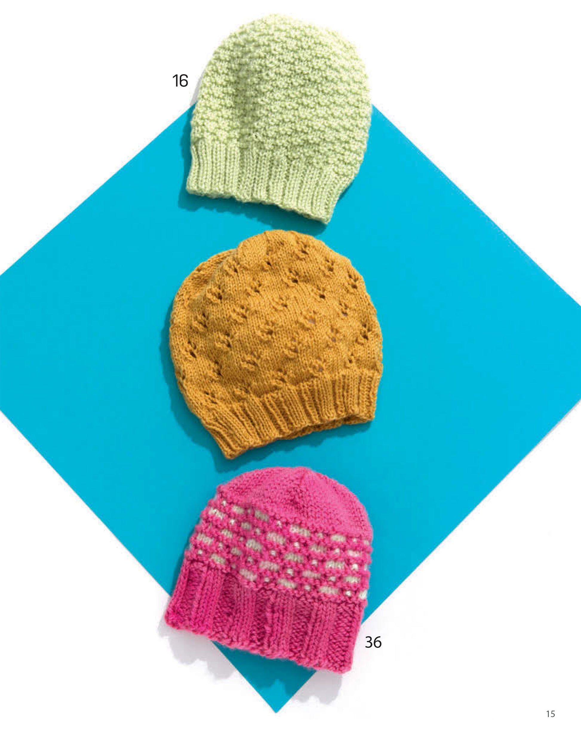 Three Leisure Arts Knit Accessories—light green, mustard yellow, and bright pink hats—are stacked vertically on a blue diamond background. Numbers 16 and 36 beside the green and pink hats highlight cozy winter styles.