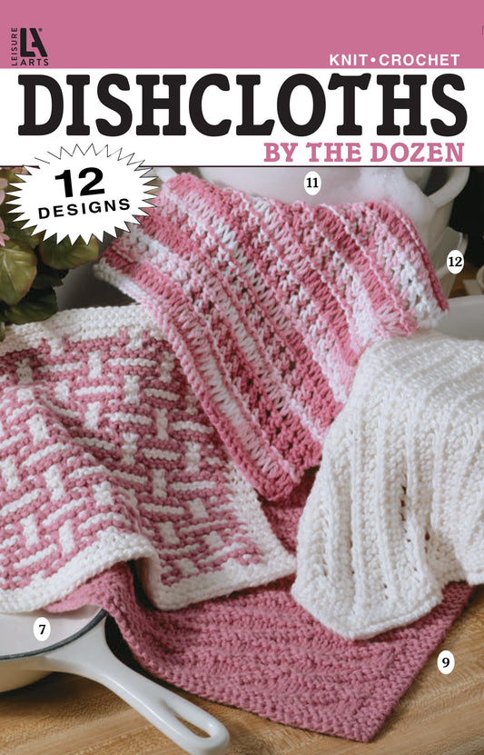 Three hand-knitted and crocheted pink and white dishcloths hang over a sink. The Leisure Arts “Dishcloths by the Dozen” magazine cover highlights 12 beginner-friendly knitting and easy crochet designs.