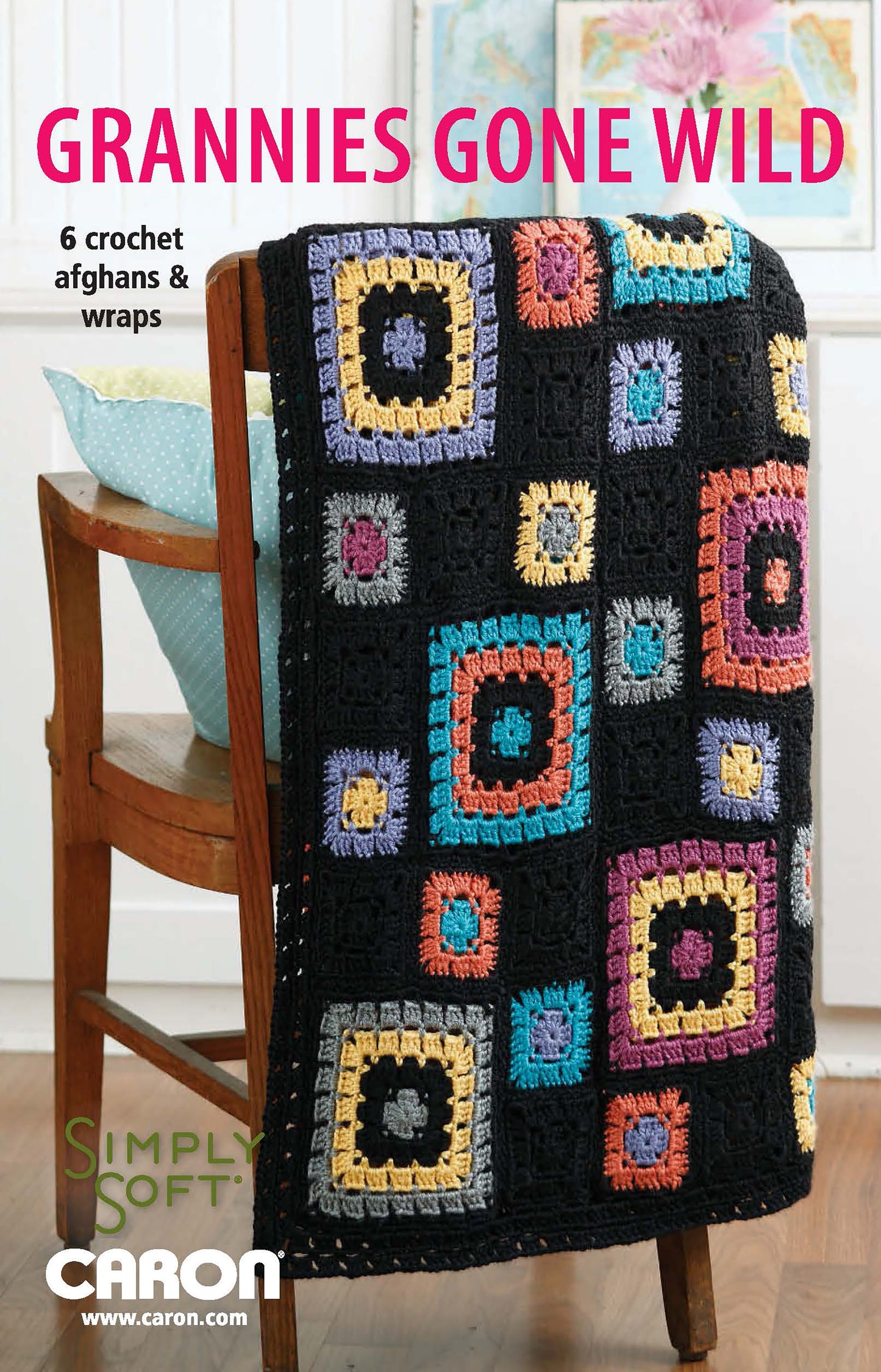 A colorful crocheted afghan with square patterns drapes over a wooden chair. Large pink text reads, “Grannies Gone Wild” by Leisure Arts—6 crochet afghans & wraps, perfect for beginner projects. Uses Simply Soft yarn by Caron.