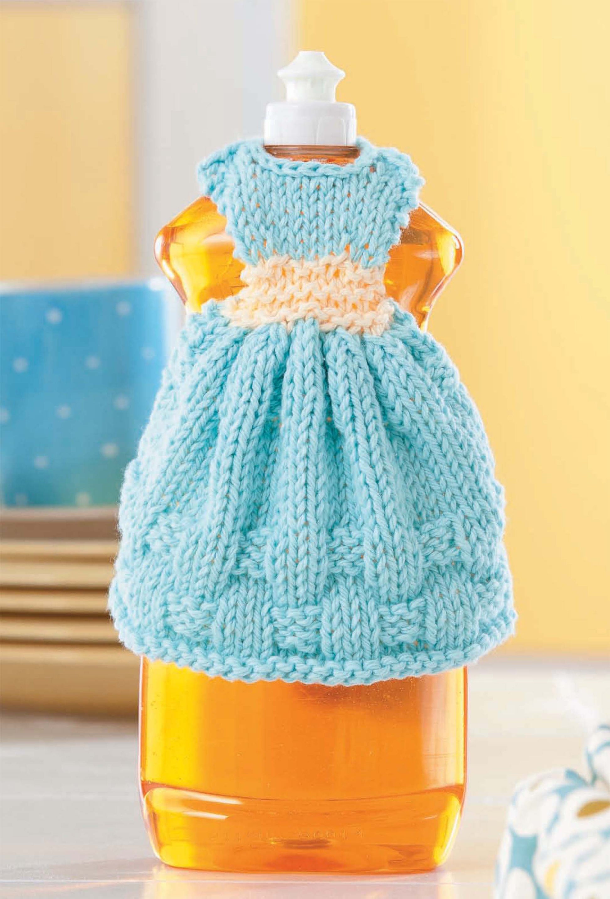 Brighten your kitchen with Leisure Arts' Dishcloth Dresses—The Cutest Quick & Easy Gifts, Ever! Digital Download. These charming knitted covers add a stylish touch to your dish detergent bottle and make dishwashing more fun.