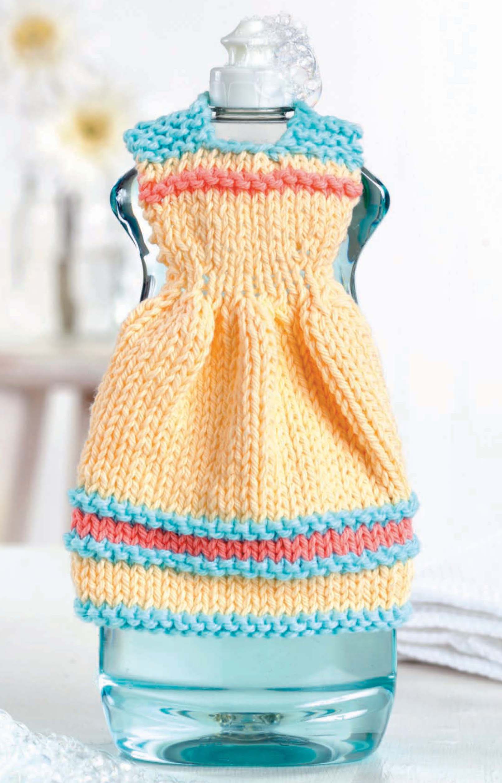 Dress up your soap dispenser with a charming Dishcloth Dress from Leisure Arts' "Dishcloth Dresses—The Cutest Quick & Easy Gifts, Ever!" digital download—the perfect way to display fun knitting patterns while adding whimsy to your kitchen.