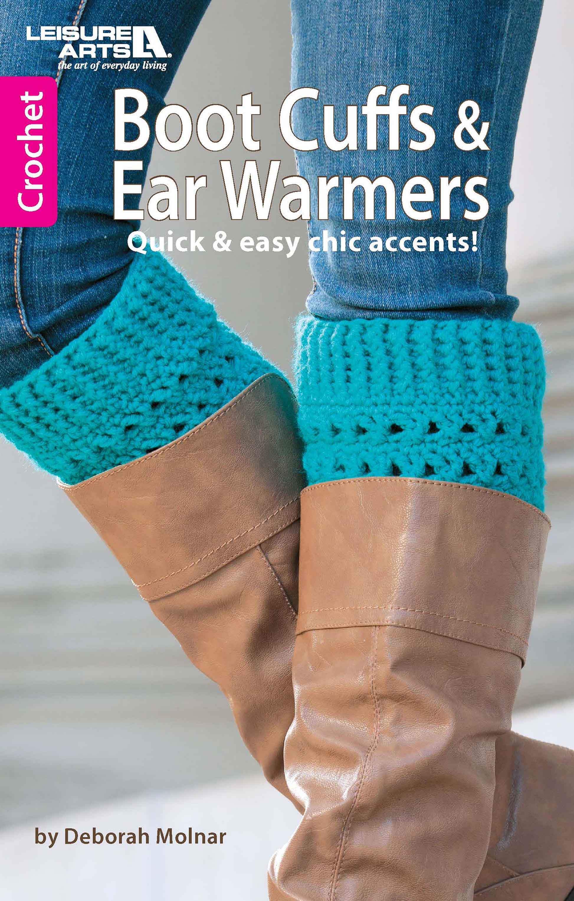 A close-up of brown boots with bright blue, beginner-friendly crocheted boot cuffs from Boot Cuffs & Ear Warmers by Leisure Arts, worn over jeans. The book cover promises quick & easy chic accents.