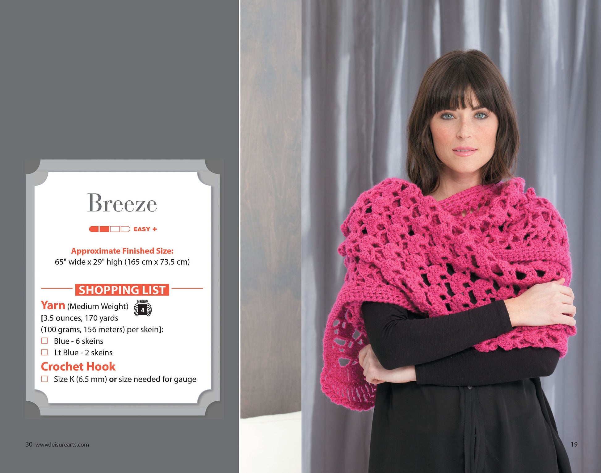 A woman with dark hair models a bright pink, lacy crocheted shawl over a black top, standing by gray curtains. Next to her is a panel with beginner crochet tips and materials for the "Everyday Shawls" pattern by Leisure Arts.