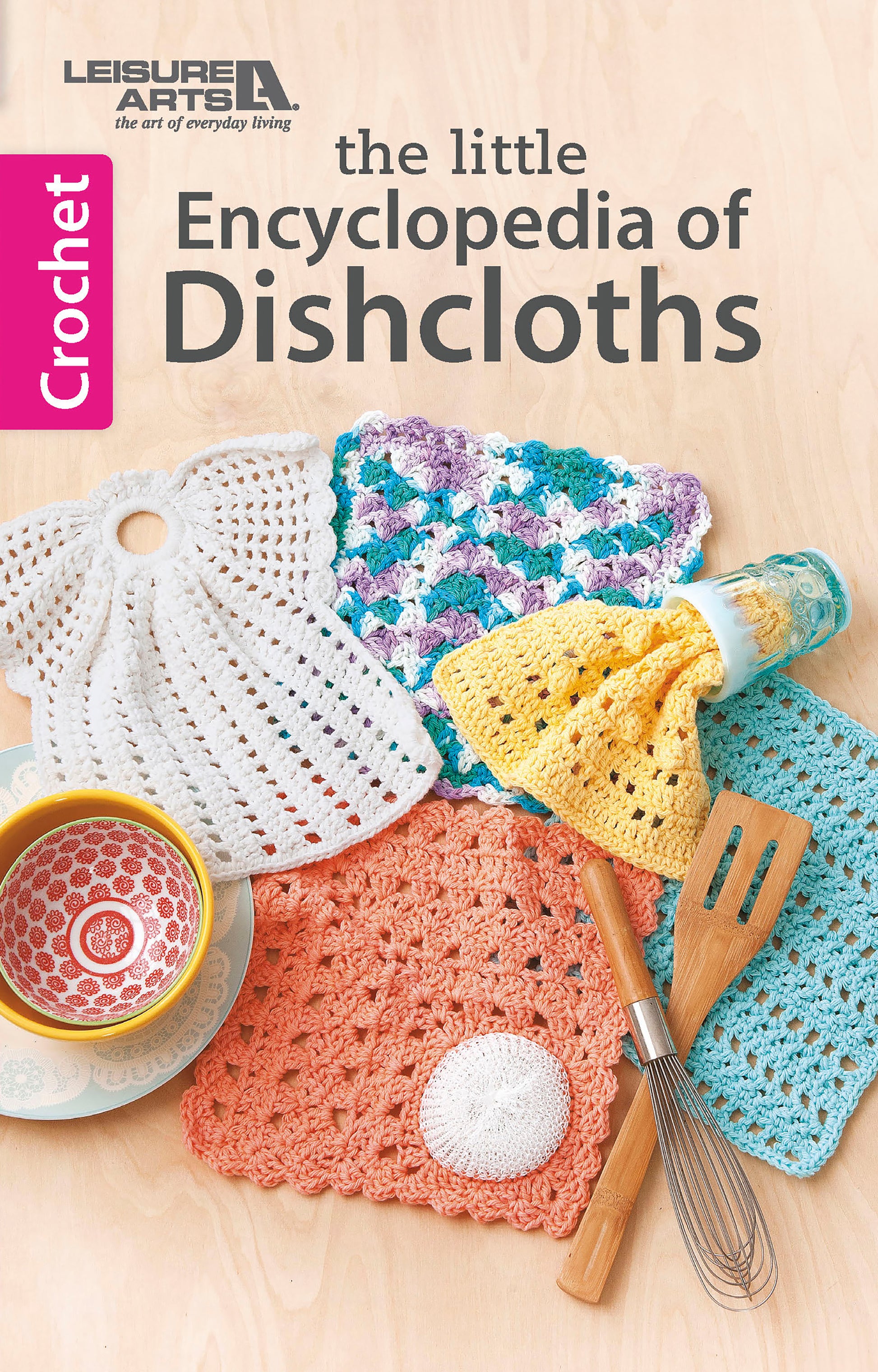 Cover of The Little Encyclopedia of Crocheted Dishcloths by Leisure Arts shows five colorful crocheted kitchen accessories with a bowl, whisk, and spatula on wood. Title and pink Crochet sidebar are visible—great for quick, easy gifts.